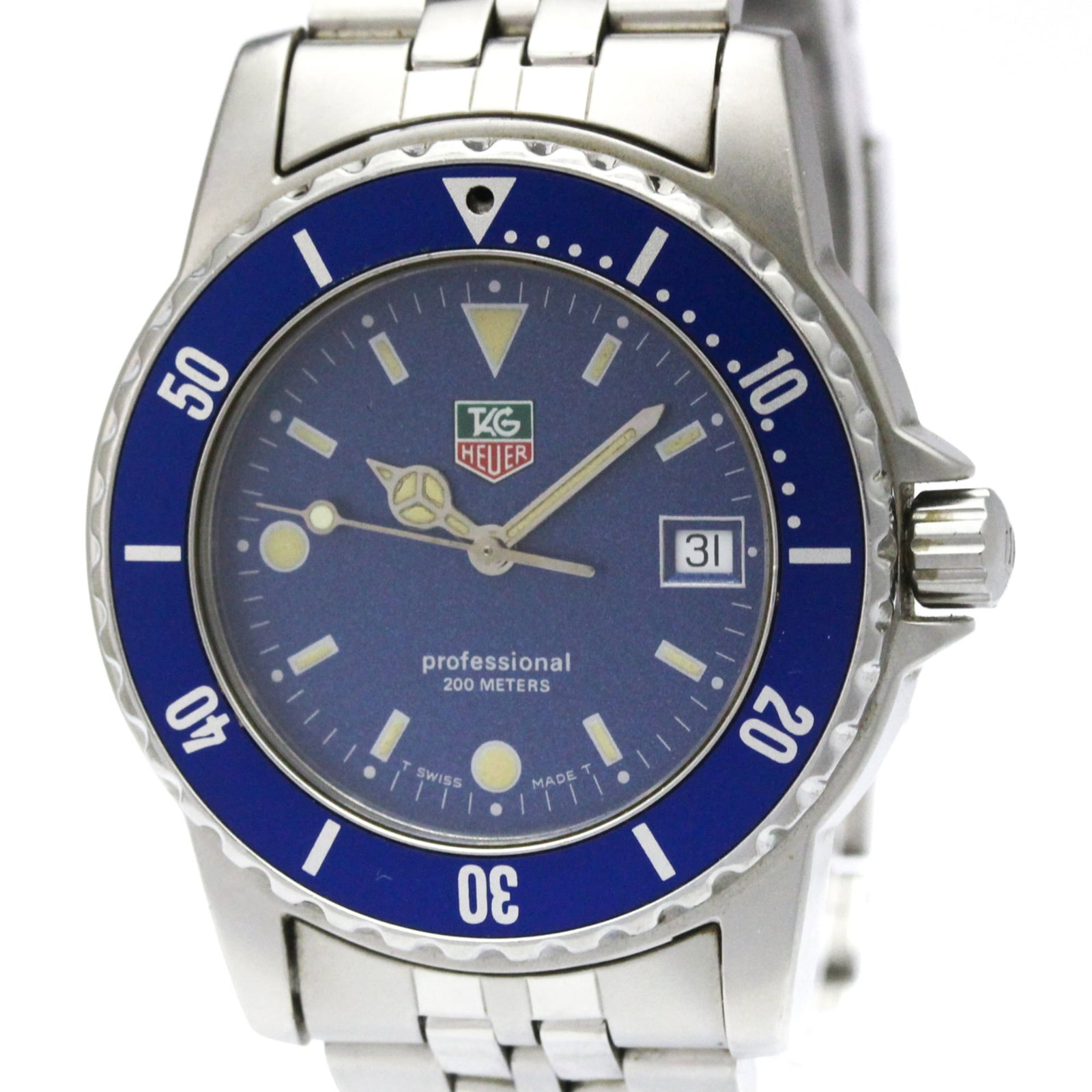 Wristwatch by Tag Heuer: Wristwatch by Tag Heuer Stainless steel case and band, the Tag Heuer Professional Wristwatch boasts a sleek blue dial. With a quartz movement and date function, this sporty timepiece is designed for e