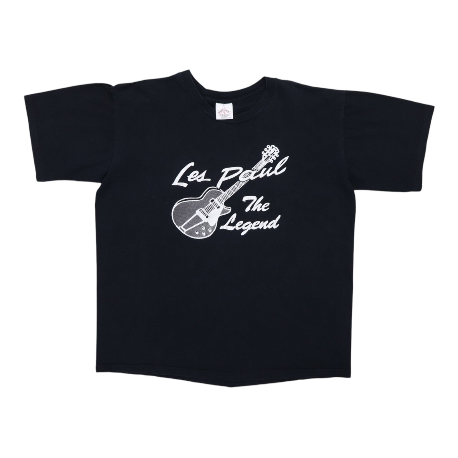 1990s Fat Tuesday's Les Paul Shirt: 1990s Fat Tuesday's Les Paul Shirt Fat Tuesday's iconic Les Paul shirt from the 1990s - a bold and eye-catching piece of music festival fashion. This vintage tee features vibrant graphics and colors t
