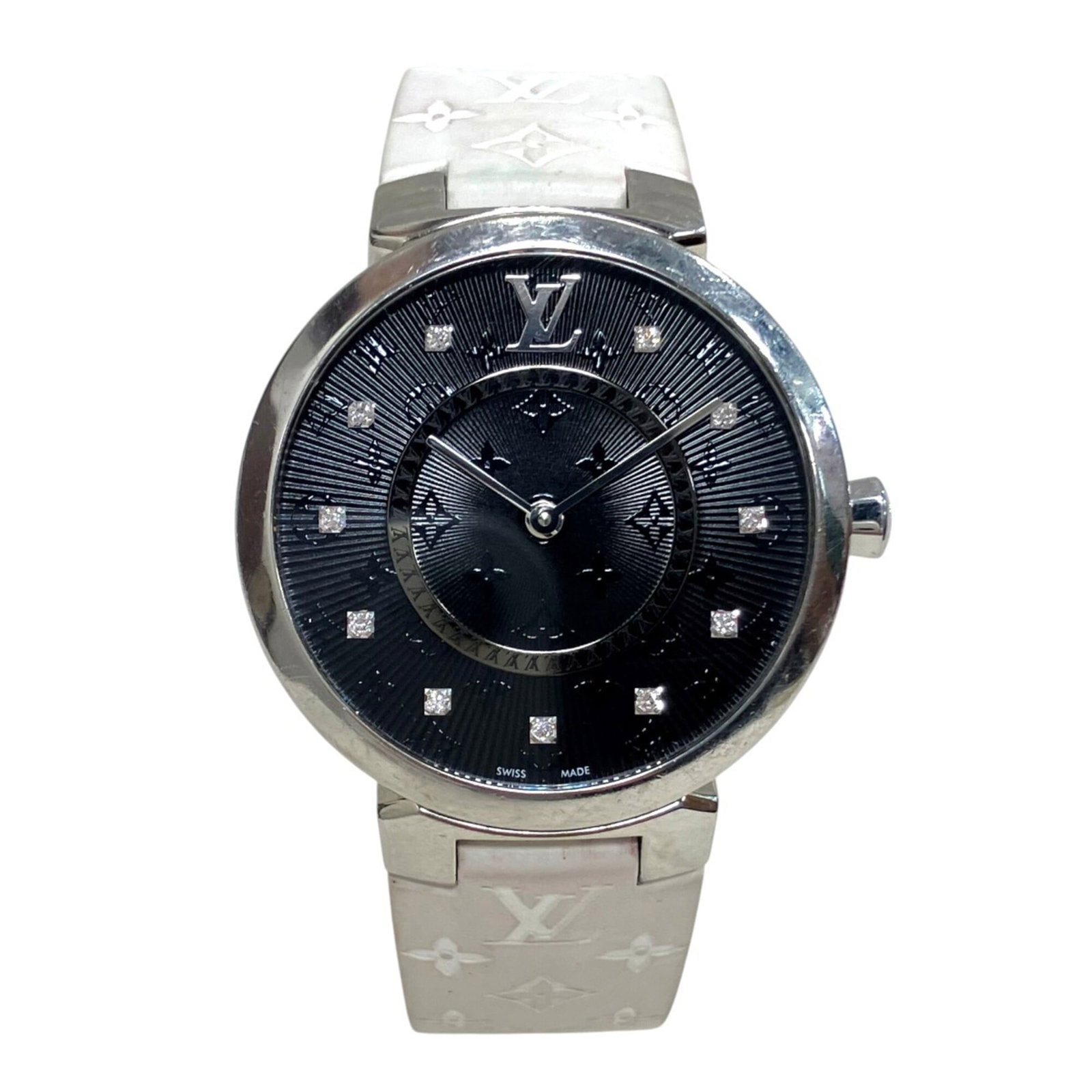 Louis Vuitton Wristwatch: Louis Vuitton Wristwatch Stainless steel case and rubber band provide a sleek, modern look for this Louis Vuitton wristwatch. The black dial stands out against the metal background, while the quartz