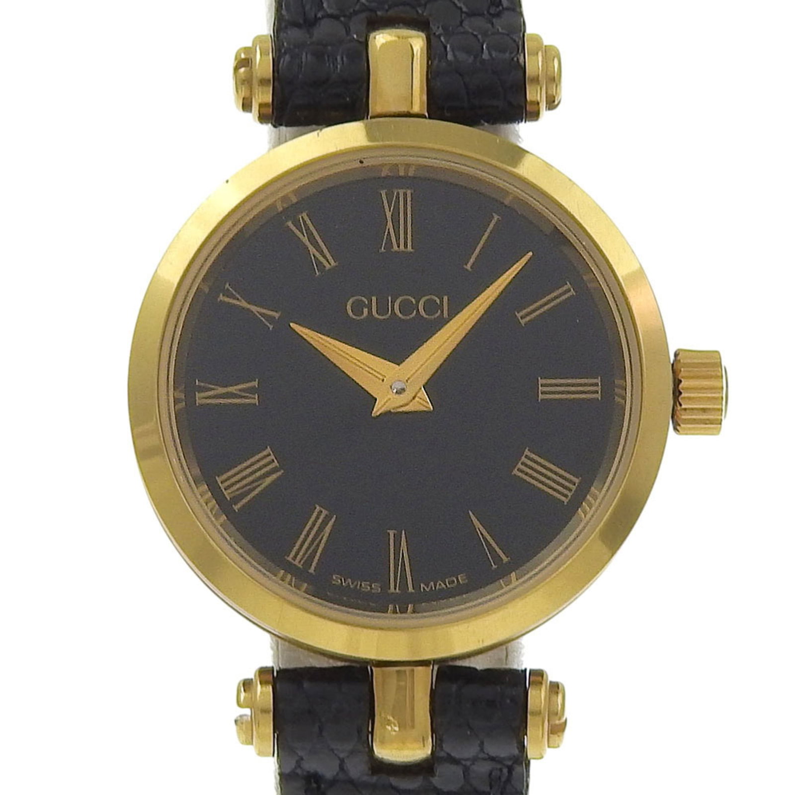 Wristwatch from Gucci: Wristwatch from Gucci Gold plated and stainless steel case, the Gucci wristwatch boasts a sleek design with a gold dial. Measuring 20mm in diameter, it's suitable for wrists ranging from 13cm to