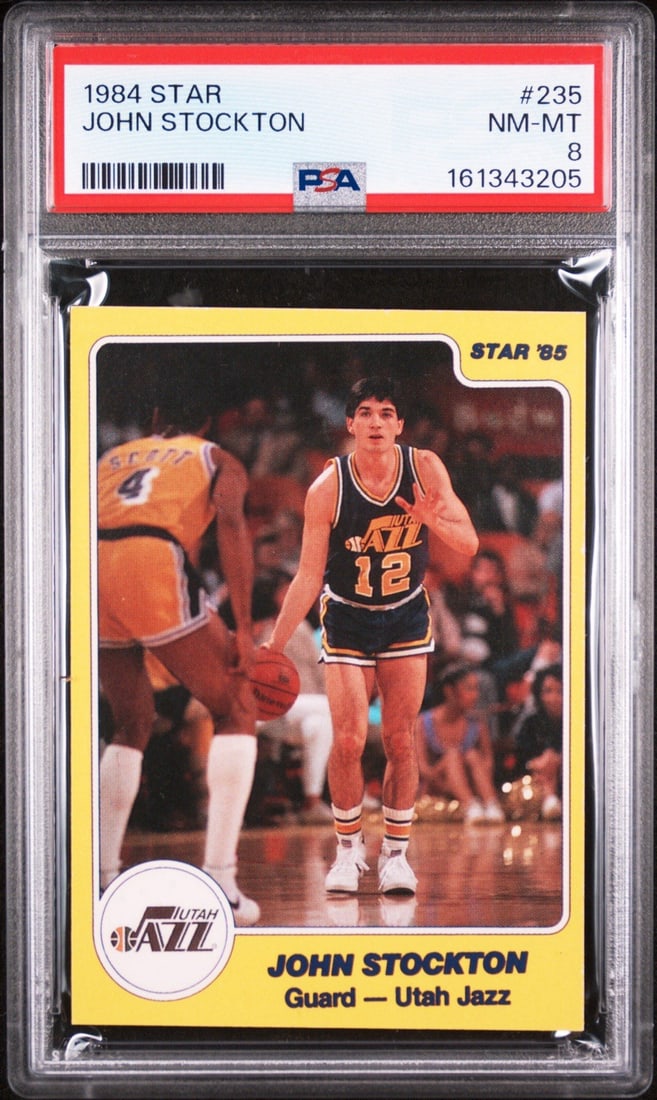 1984 STAR JOHN STOCKTON #235 PSA 8: 1984 STAR JOHN STOCKTON #235 PSA 8 PSA 8 graded card, featuring John Stockton #235 from the 1984 Star set. This card showcases Stockton's impressive basketball skills and is a great addition to any sp