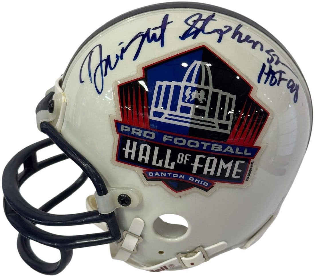 Hall of Fame Mini Helmet Autographed By Dwight Stephenson: Hall of Fame Mini Helmet Autographed By Dwight Stephenson Signed in blue sharpie by Hall of Famer Dwight Stephenson, this mini helmet bears the inscription "HOF 98" on its side. A unique piece for