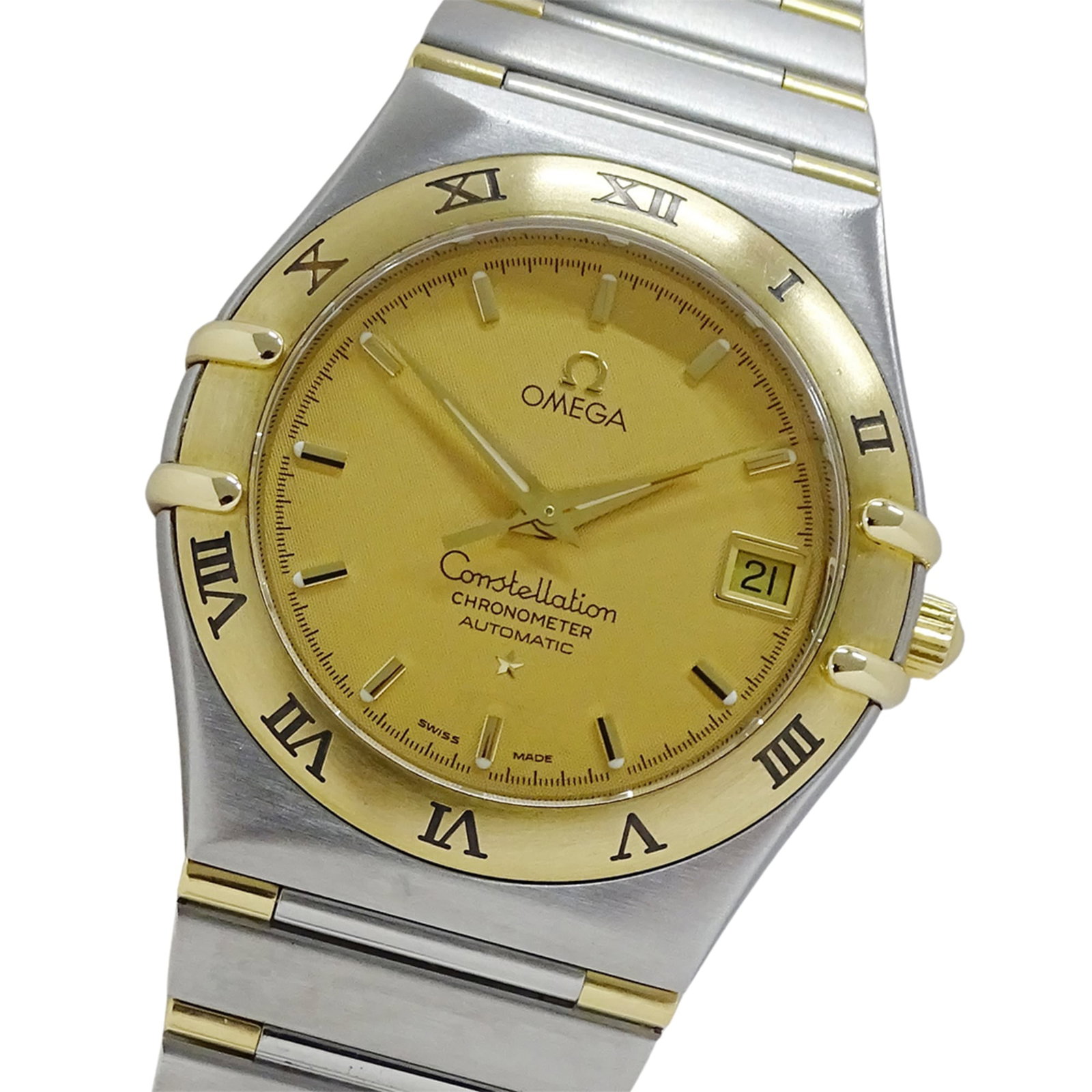 Omega Wristwatch: Omega Wristwatch Stainless steel and yellow gold make up the durable case and band of this Omega wristwatch, with a gold dial adding a touch of elegance. Powered by a self-winding automatic movement,