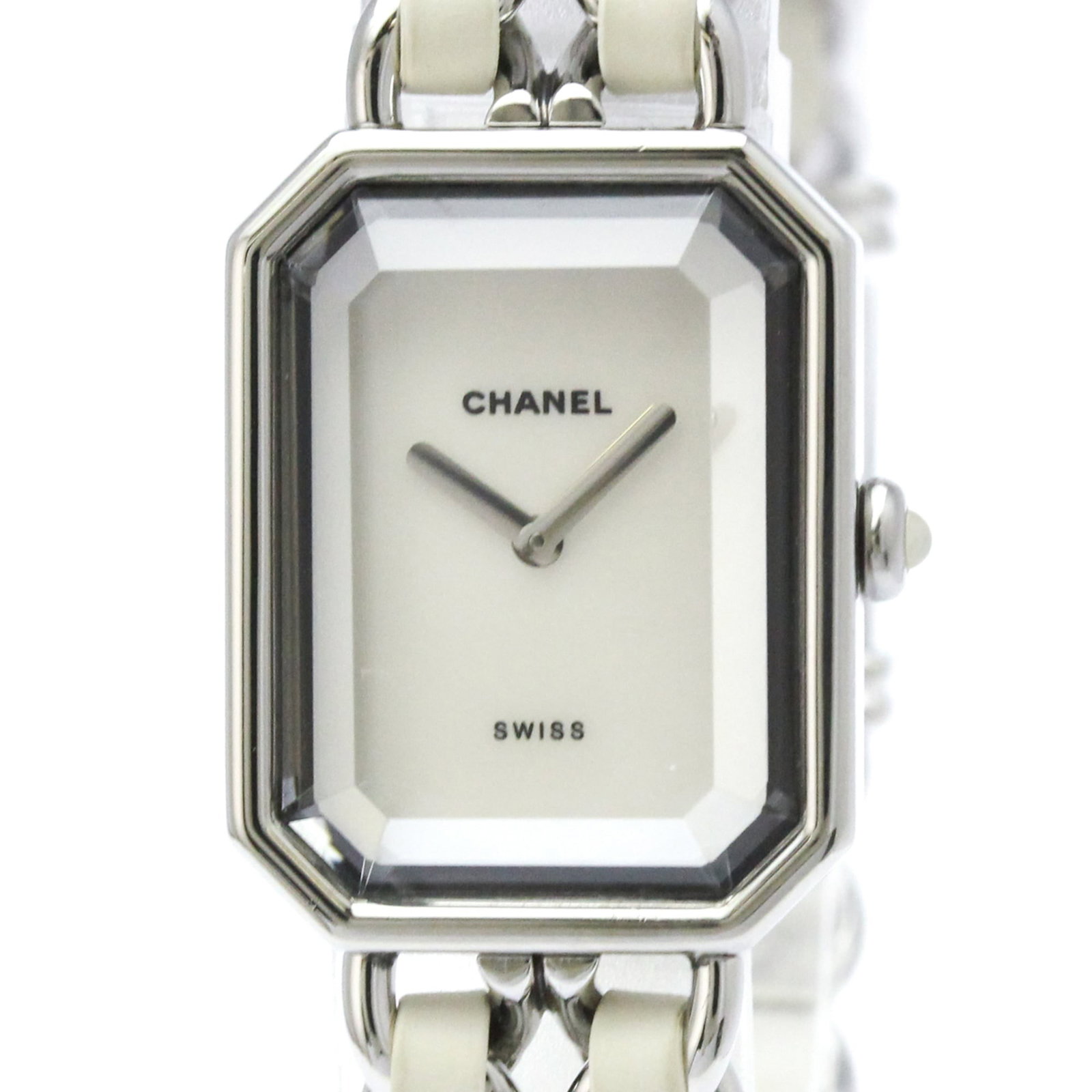 Chanel Wristwatch: Chanel Wristwatch Stainless steel case and leather band combine for a sleek, formal look. The white shell dial adds a touch of elegance to this quartz-powered Chanel wristwatch, perfect for dressing u