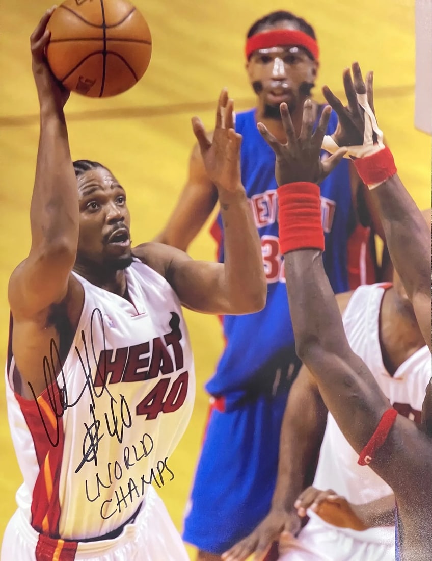 Udonis Haslem Autographed 16x20 Basketball Photo: Udonis Haslem Autographed 16x20 Basketball Photo Signed across the front in black sharpie, Udonis Haslem's inscription "World Champs" adds a personal touch to this official 16x20 basketball photo. The