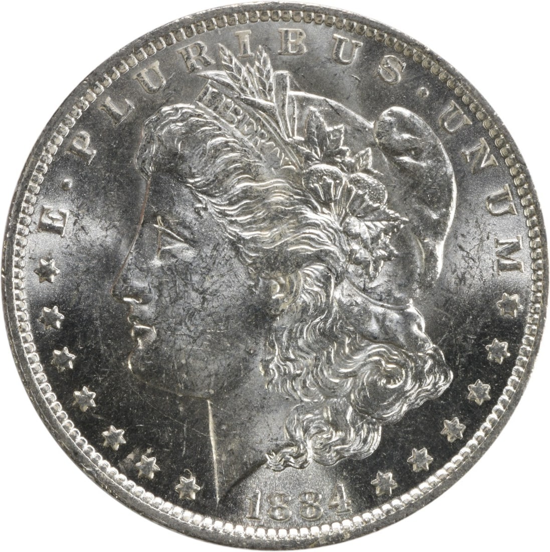 Silver Dollar Choice BU 1884 Morgan Uncertified: Silver Dollar Choice BU 1884 Morgan Uncertified Choice BU 1884 Morgan Uncertified Silver Dollar, featuring the iconic design of George T. Morgan, with a circulated appearance despite being uncirculate