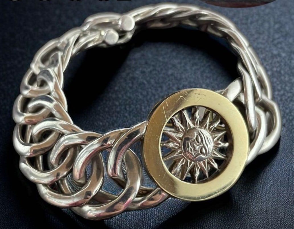 Gucci Sun Motif Chain Bracelet Sterling Silver and 18K Yellow Gold 7.48 inches: Gucci Sun Motif Chain Bracelet Sterling Silver and 18K Yellow Gold 7.48 inches Item Specifics: Brand: Gucci Type: Bracelet Metal Purity: 925 18K Color: Silver Gold Style: bracelet Base Metal: Sterling