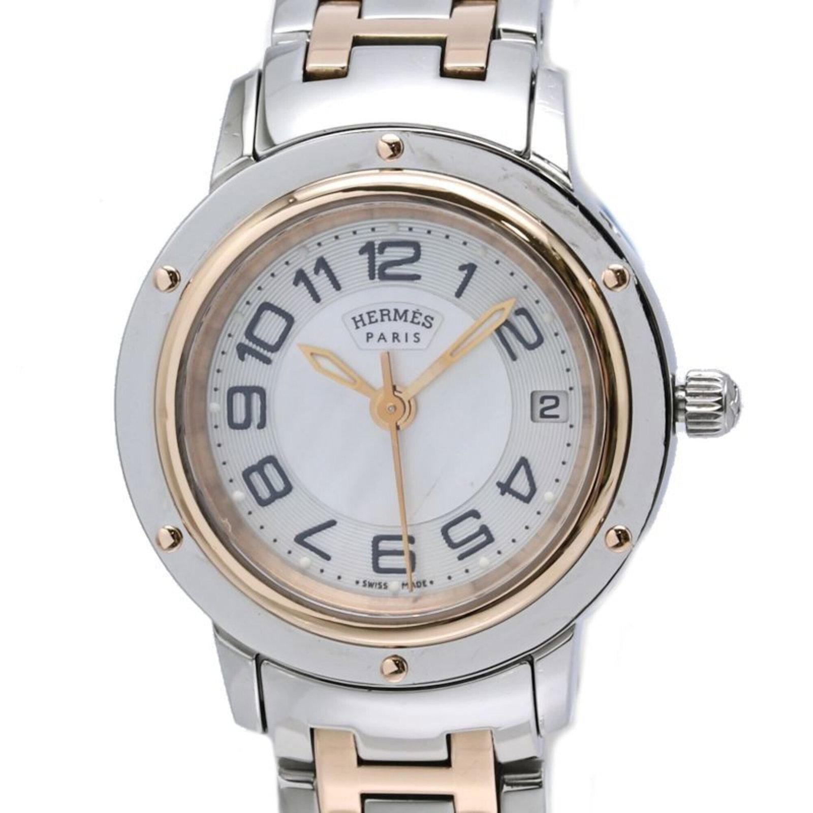 Hermes Wristwatch: Hermes Wristwatch Pink gold plated and stainless steel, this elegant Herm?s wristwatch boasts a white shell dial and features a quartz movement. The 24mm case diameter makes it perfect for smaller wri