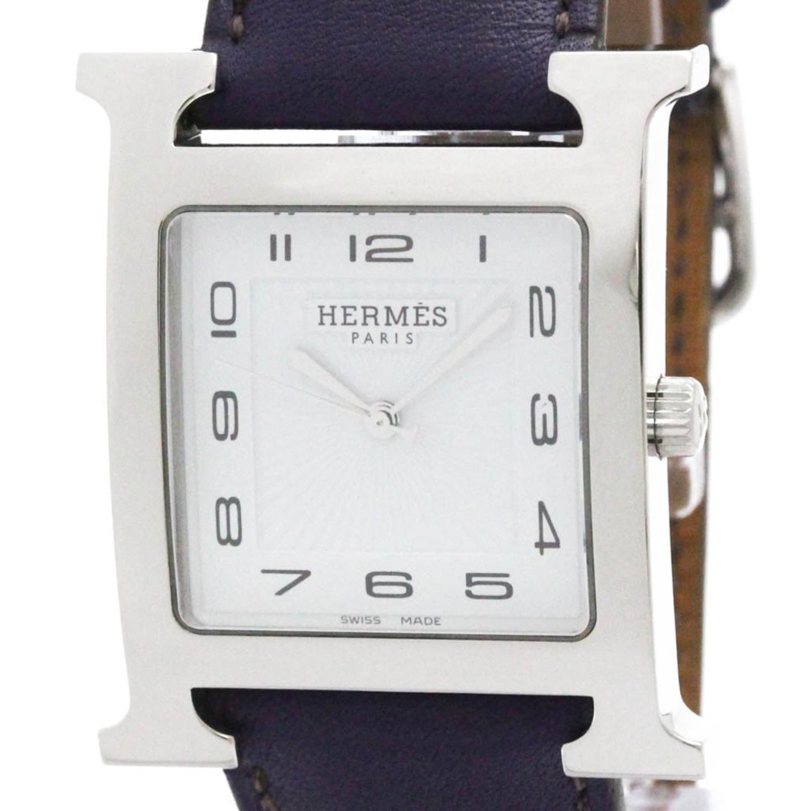 Hermes Wristwatch: Hermes Wristwatch Stainless steel case and leather band give this Hermes Heure H watch its sleek, dressy look. The white dial features quartz movement for reliable timekeeping. With a compact 30mm