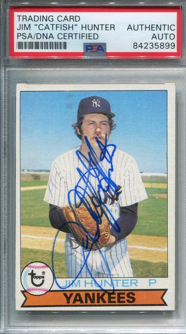 Jim "Catfish" Hunter Autographed Baseball Card (PSA): Jim "Catfish" Hunter Autographed Baseball Card (PSA) Signed by Jim "Catfish" Hunter in sharpie, this baseball card has been authenticated and slabbed by PSA. The autograph is located across the front 