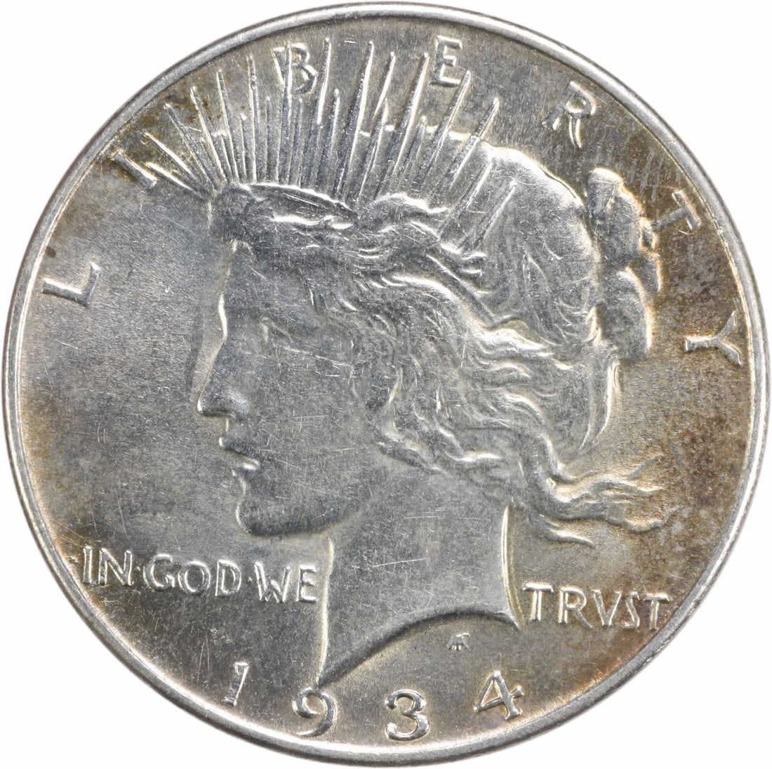 Peace Silver Dollar 1934 Uncertified Slider: Peace Silver Dollar 1934 Uncertified Slider The 1934 Peace Silver Dollar is a circulated coin featuring the iconic design of the Peace quarter eagle, minted from pure silver. This Uncertified Slider