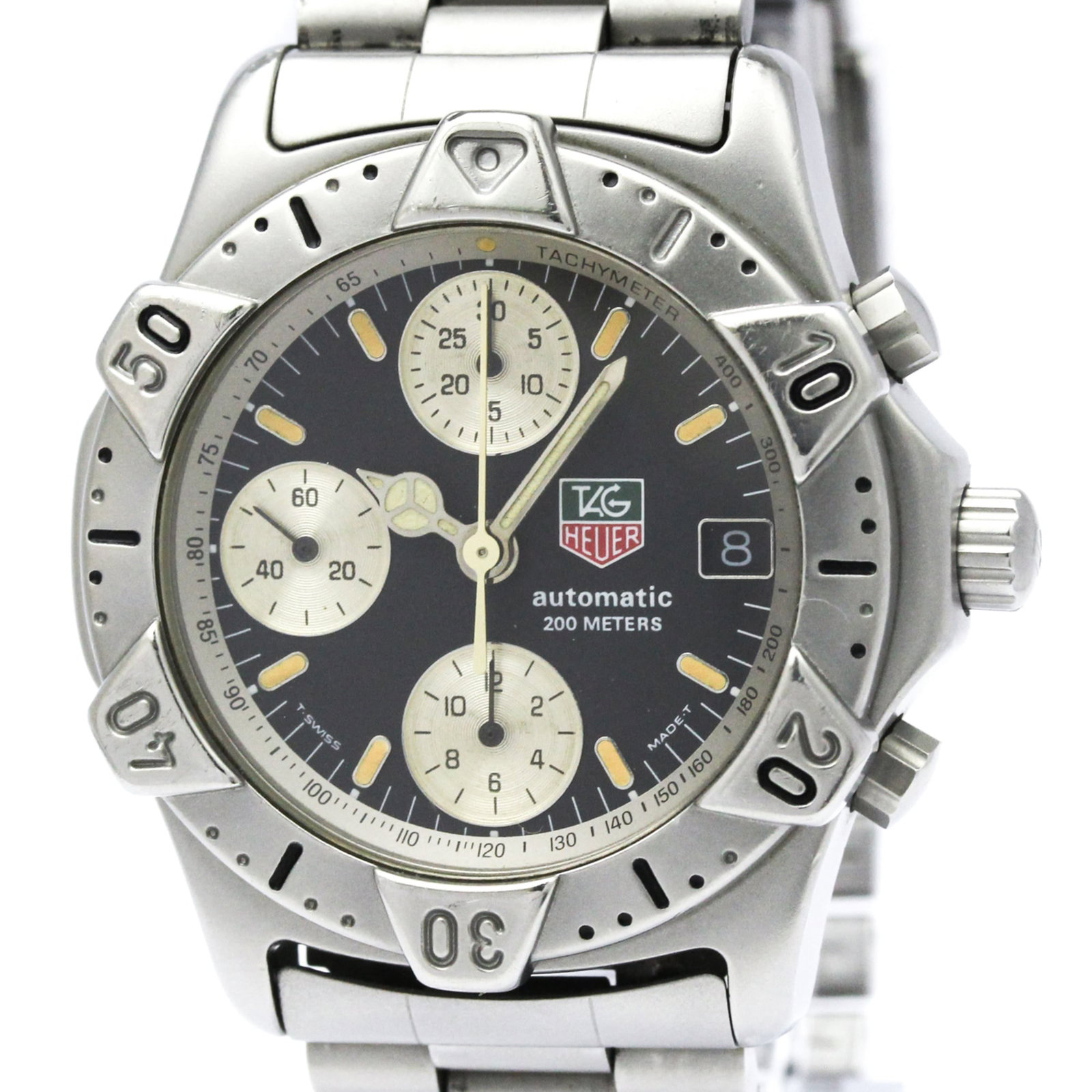 Wristwatch by Tag Heuer: Wristwatch by Tag Heuer Stainless steel case and band, paired with a black dial, make for a sleek sport watch design. This self-winding automatic chronograph features a date display and weighs in at 1