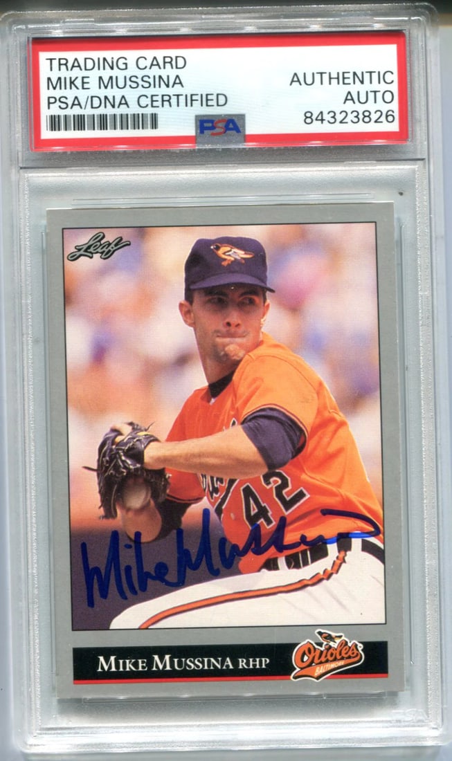 Mussina Mike 1992 PSA Auth Leaf Card Autographed #13: Mussina Mike 1992 PSA Auth Leaf Card Autographed #13 Mike Mussina's sharpie signature across the front of his 1992 Leaf card (#13) adds a unique touch to this PSA Authenticated collectible. The Profes
