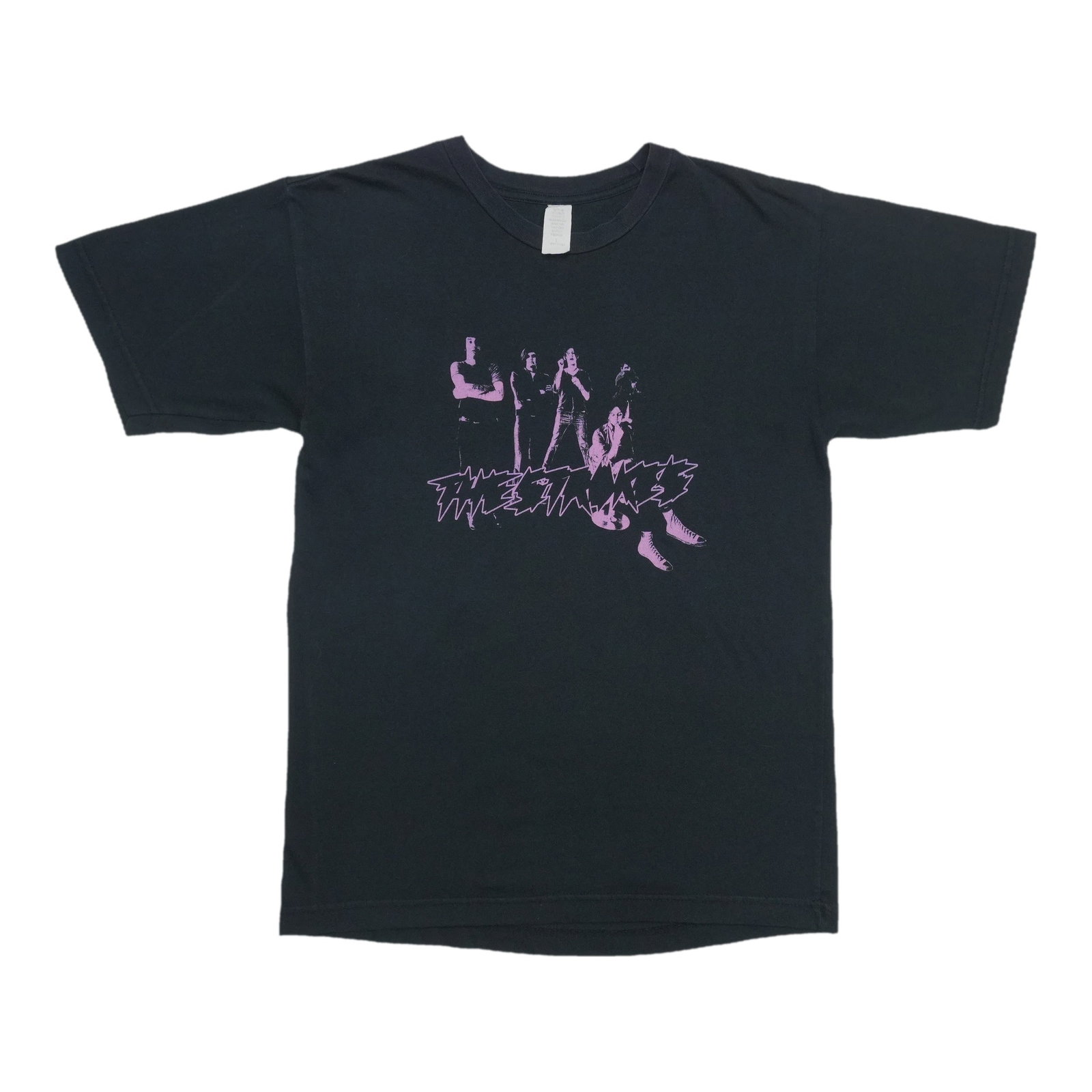 2000s The Strokes Shirt: 2000s The Strokes Shirt Authentic vintage The Strokes shirt from the early 2000s. This classic band tee features bold graphics and colors reminiscent of the iconic era of indie rock. A must-have for
