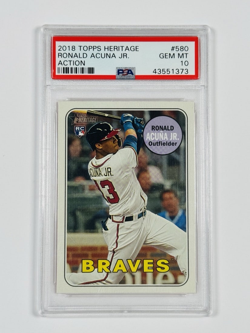 ACTION ROOKIE PSA 10 #580 TOPPS 2018 HERITAGE RONALD ACUNA JR: ACTION ROOKIE PSA 10 #580 TOPPS 2018 HERITAGE RONALD ACUNA JR PSA 10 #580 Topps Heritage card features Ronald Acuna Jr. in action, showcasing his impressive skills as an Atlanta Braves player. This hi