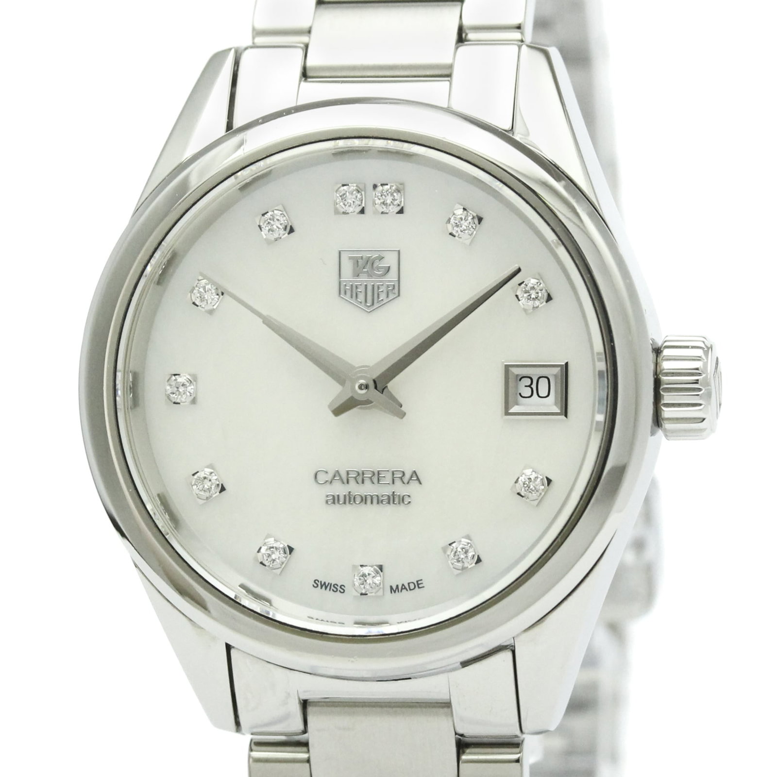 Wristwatch by Tag Heuer: Wristwatch by Tag Heuer Stainless steel case and band, the Tag Heuer Carrera wristwatch boasts a sleek white shell dial. Powered by a self-winding automatic movement, this timepiece features date func