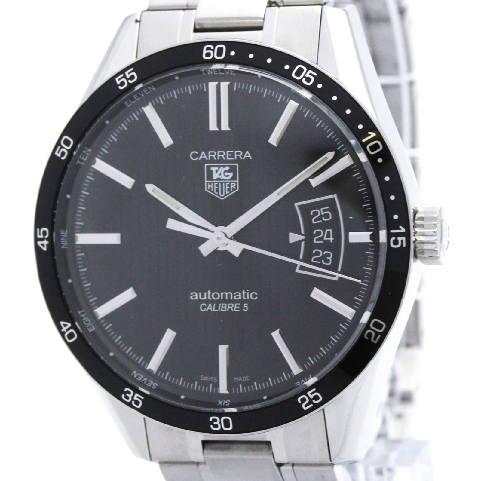 Wristwatch by Tag Heuer: Wristwatch by Tag Heuer Stainless steel case and band, the Tag Heuer Carrera wristwatch boasts a sleek black dial. Powered by a self-winding automatic movement, this sporty timepiece weighs in at just