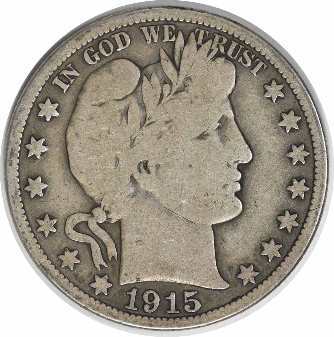 Uncertified Silver Half Dollar 1915 Barber Dollar: Uncertified Silver Half Dollar 1915 Barber Dollar The 1915 Barber Dollar features an iconic design with its classic portrait and flowing hair, set against a silver background. This circulated coin sho