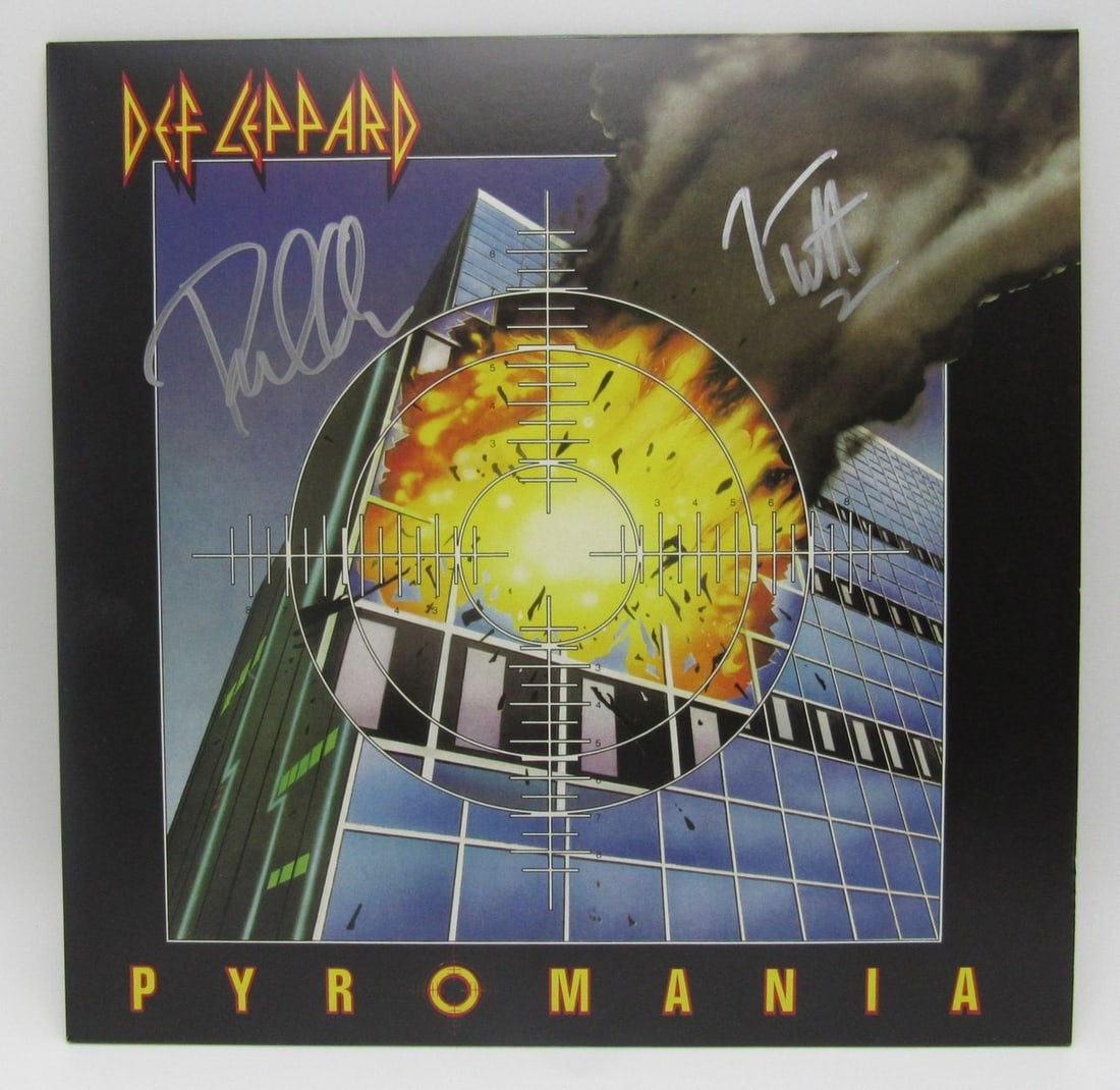 Joe Elliott/ Phil Collen Dual-Signed/ Auto Def Leppard Pyromania Album JSA 208898: Joe Elliott/ Phil Collen Dual-Signed/ Auto Def Leppard Pyromania Album JSA 208898 Dual-signed photograph of Joe Elliott and Phil Collen from the iconic Def Leppard album Pyromania, bearing a JSA