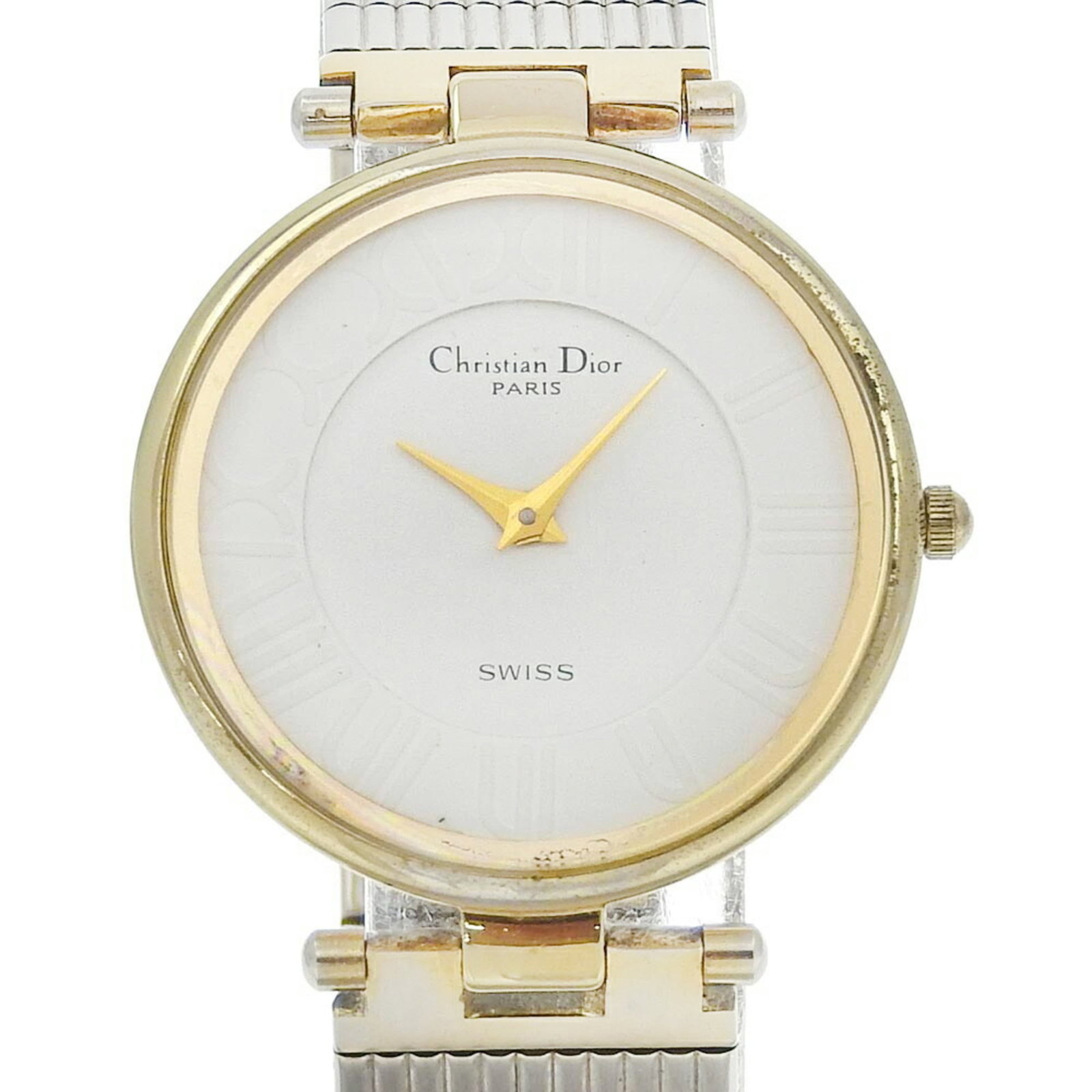 Wristwatch by Christian Dior: Wristwatch by Christian Dior Stainless steel case and band make up the sleek silhouette of this Christian Dior wristwatch, with a white dial adding a touch of modern elegance. The quartz movement keep