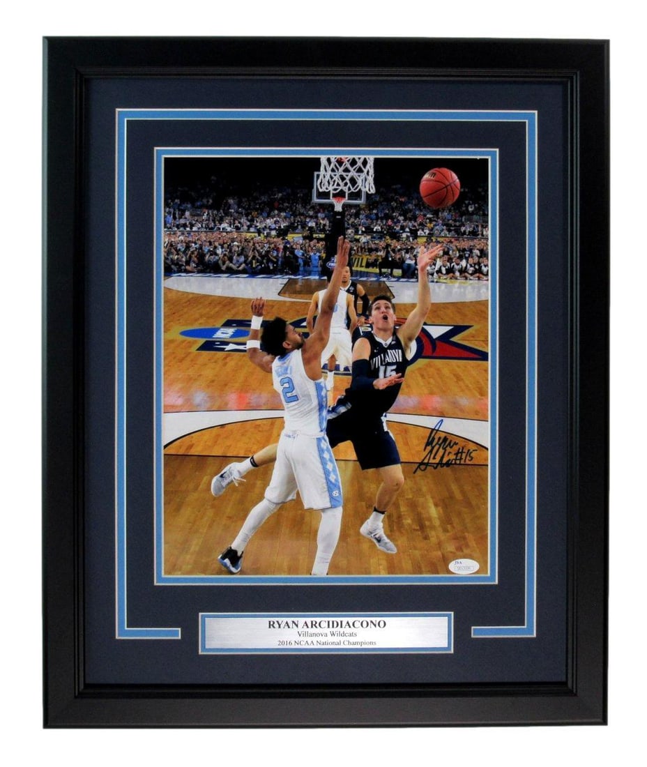 Ryan Arcidiacono Autographed Photo Villanova JSA Framed 11x14: Ryan Arcidiacono Autographed Photo Villanova JSA Framed 11x14 Original photo of Ryan Arcidiacono, Villanova's star player, autographed by the athlete. The item is framed in an 11x14 inch format and co
