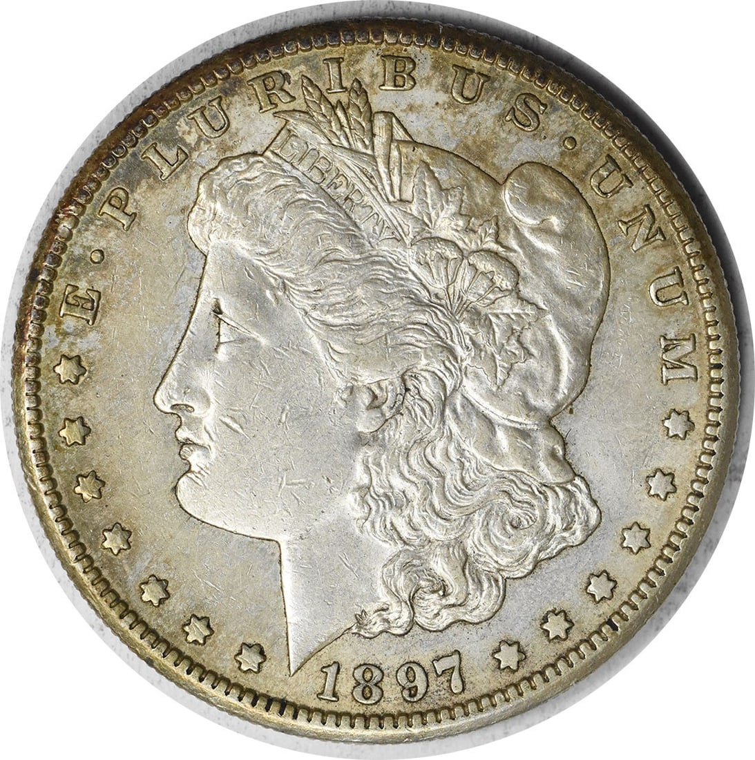 Morgan Silver Dollar 1897-S Slider Uncertified Au: Morgan Silver Dollar 1897-S Slider Uncertified Au The Morgan Silver Dollar 1897-S Slider Uncertified Au features a unique circulated condition, showcasing its age and wear. With a striking reeded edge