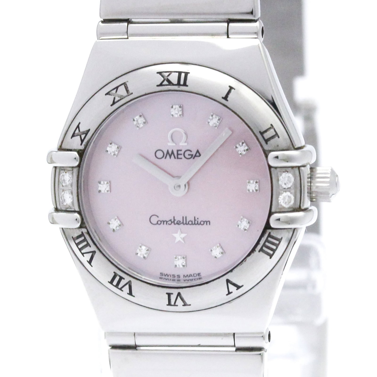 Omega Wristwatch: Omega Wristwatch Stainless steel case and band add a sleek touch to this pink shell Omega Constellation wristwatch, measuring 22mm in diameter. Powered by a quartz movement, its compact design makes i