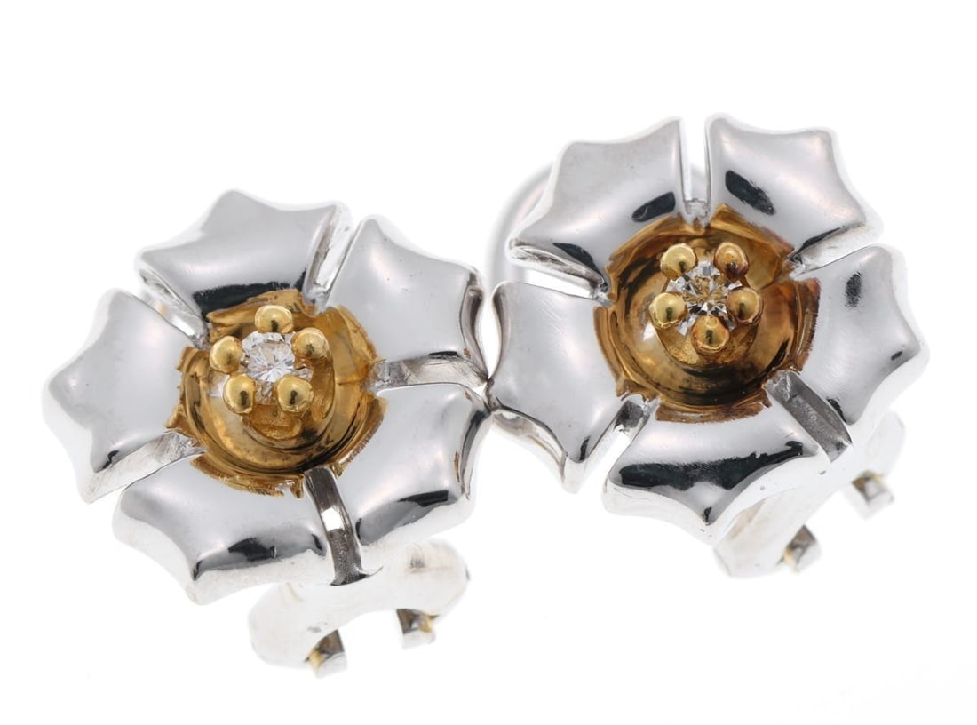 Yellow Gold and White Gold Diamond Motif Flower Clip On Earring by Georg Jensen: Yellow Gold and White Gold Diamond Motif Flower Clip On Earring by Georg Jensen Item Specifics: Brand: Georg Jensen Number Of Diamonds: 2 Shape: Flower Metal Purity: 18k Color: White Gold Yellow Gold 