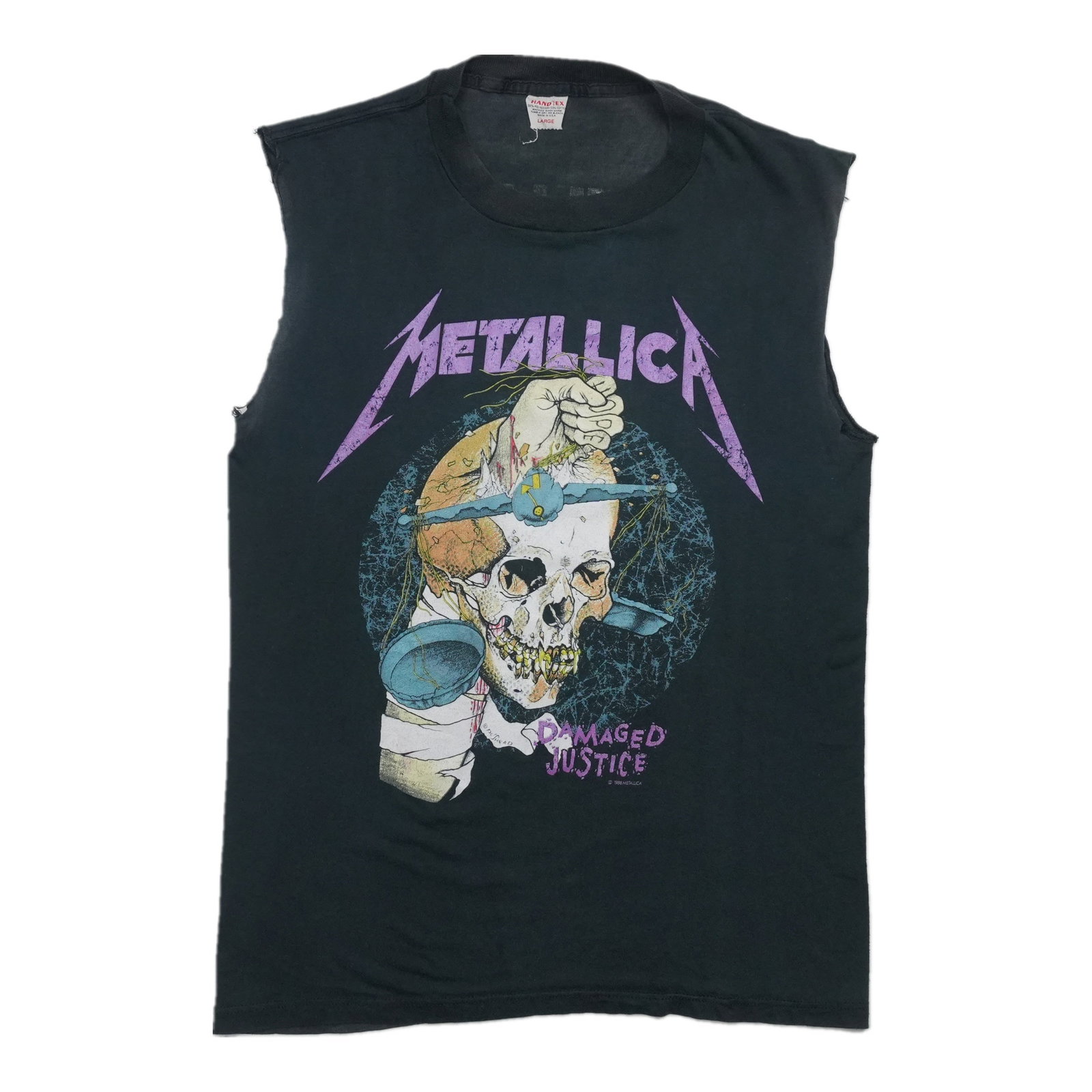 Metallica Damaged Justice Tour Shirt: Metallica Damaged Justice Tour Shirt Metallica Damaged Justice Tour Shirt - A rare piece from the iconic Metallica tour, featuring a unique design and worn-in look. This shirt has been carefully