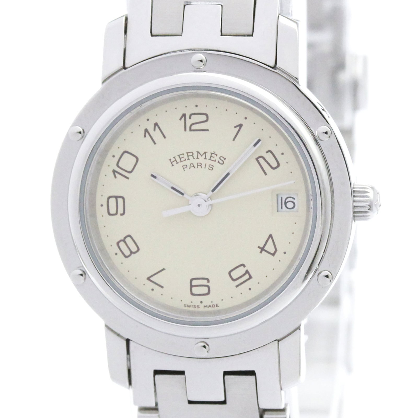 Hermes Wristwatch: Hermes Wristwatch Stainless steel case and band, the Hermes Clipper Wristwatch boasts a sleek, formal design with an ivory dial. This quartz-powered timepiece features a date function and weighs just