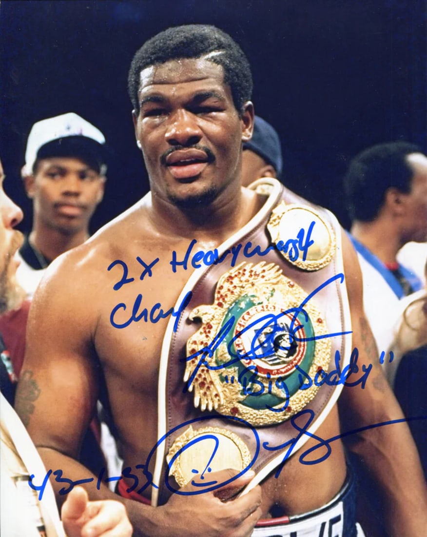 Riddick Big Daddy Bowe 2x Champ Autographed 8x10 Photo: Riddick Big Daddy Bowe 2x Champ Autographed 8x10 Photo Item Specifics: Riddick Bowe Autographed 8x10 Photo Signed in blue sharpie across the front of the photo Riddick is posing for the camera, while 