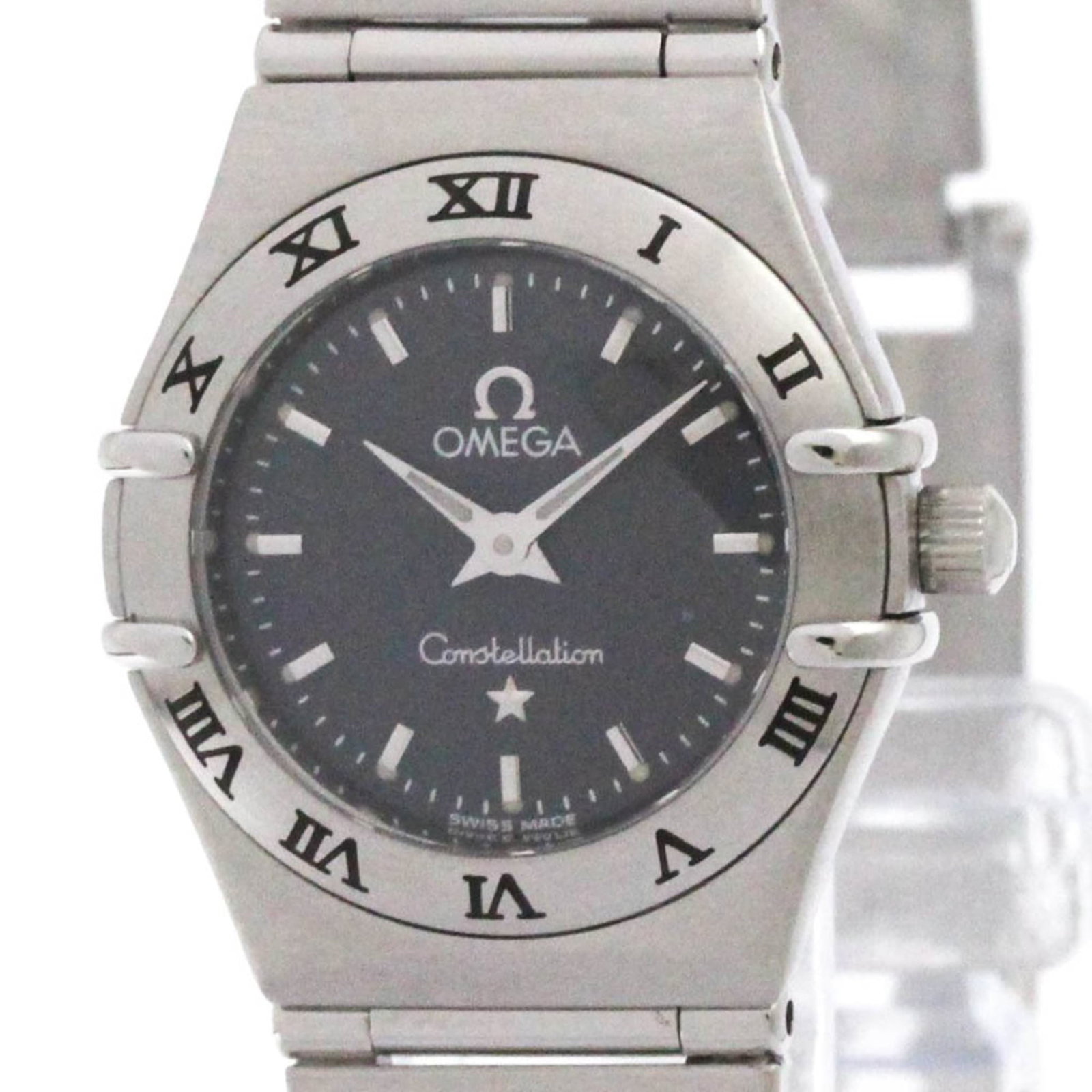 Omega Wristwatch: Omega Wristwatch Stainless steel case and band make this Omega Constellation watch durable and stylish. The gray quartz movement powers a timepiece with a classic, elegant design. Weighing just 40g,