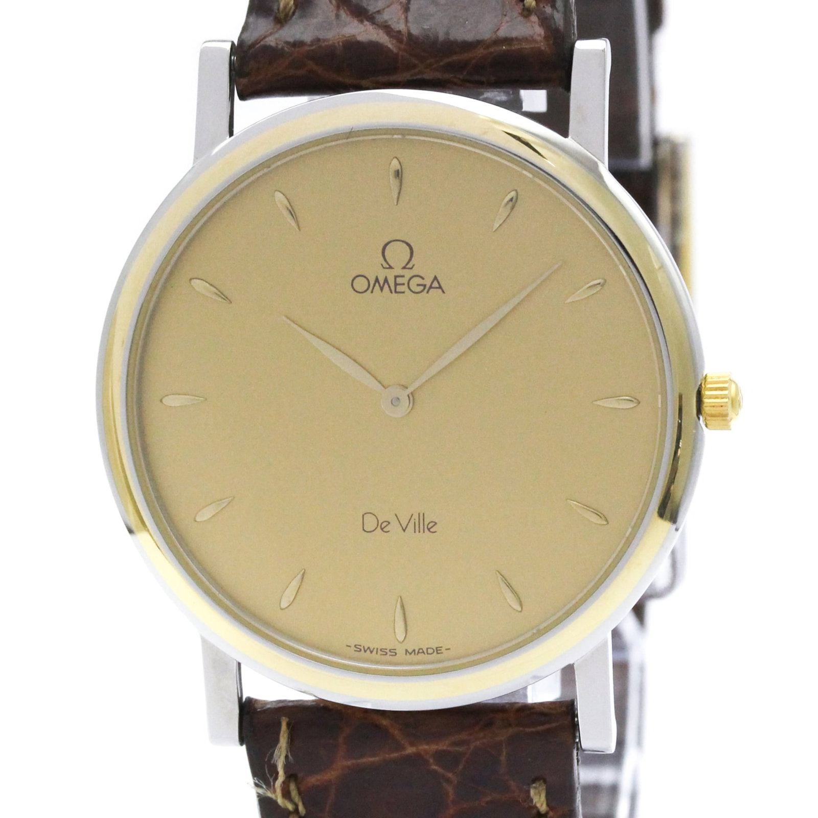 Omega Wristwatch: Omega Wristwatch The Omega De Ville wristwatch boasts a sleek gold-plated case and stainless steel band, complemented by a leather strap in gold. Powered by a reliable quartz movement, this timepiece 
