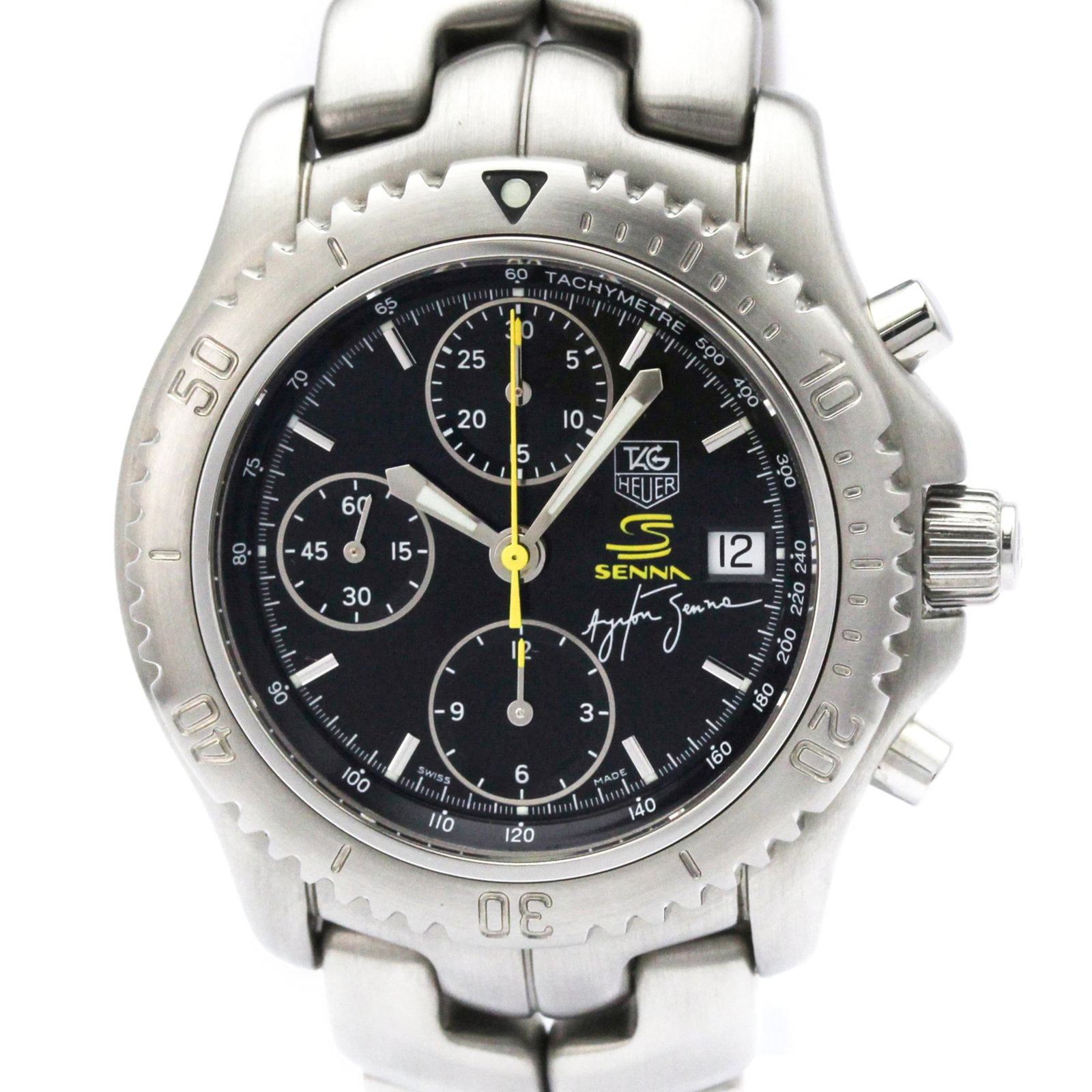 Wristwatch by Tag Heuer: Wristwatch by Tag Heuer Stainless steel case and band, the CT2115 Tag Heuer Link watch boasts a sleek black dial. Powered by self-winding automatic movement, it features chronograph and date functions