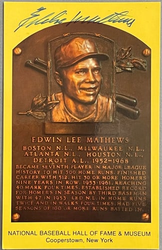 Hall of Fame Autographed by Eddie Mathews: Hall of Fame Autographed by Eddie Mathews Signed by Hall of Famer Eddie Mathews in blue sharpie across the front of his baseball plaque, this unique postcard showcases an iconic piece of baseball hist