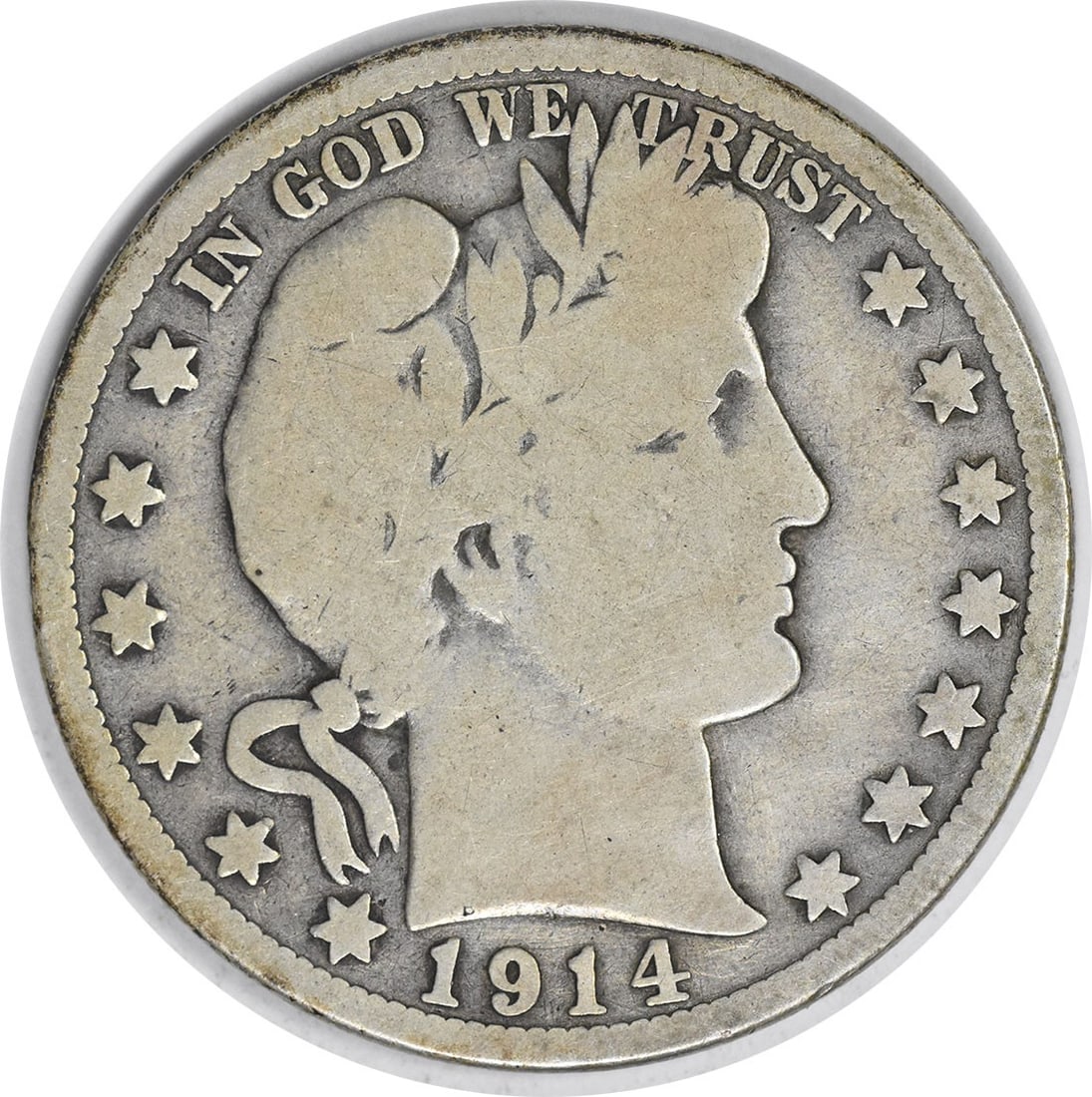 1914 Barber Silver Half Dollar VG Uncertified: 1914 Barber Silver Half Dollar VG Uncertified The 1914 Barber Silver Half Dollar is a circulated coin with a grade of VG, bearing the signature of its artist. Made from silver and featuring the iconic