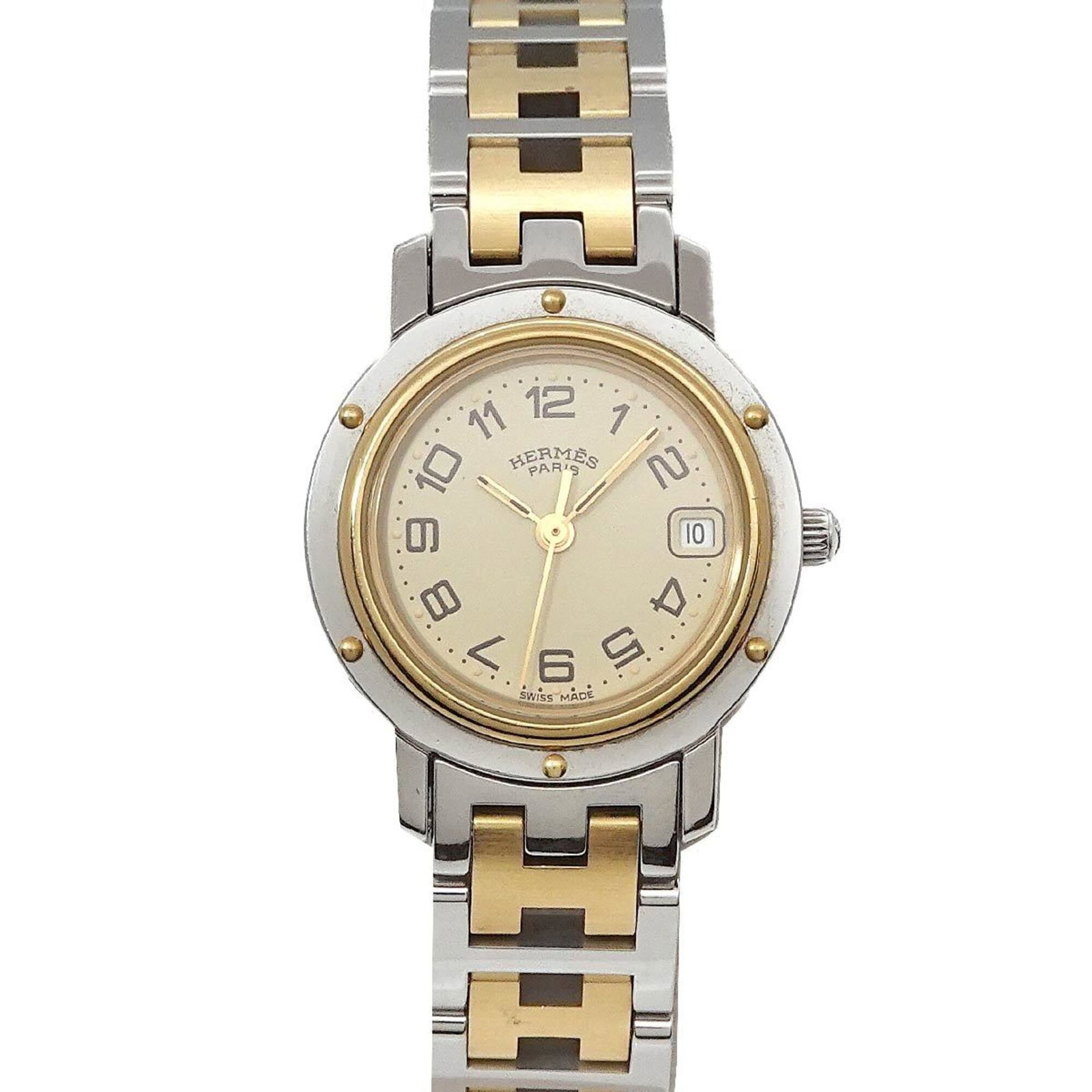 Hermes Wristwatch: Hermes Wristwatch The Hermes Wristwatch boasts an elegant ivory dial, complemented by gold plated and stainless steel materials throughout. With its quartz movement and date function, this timepiece o