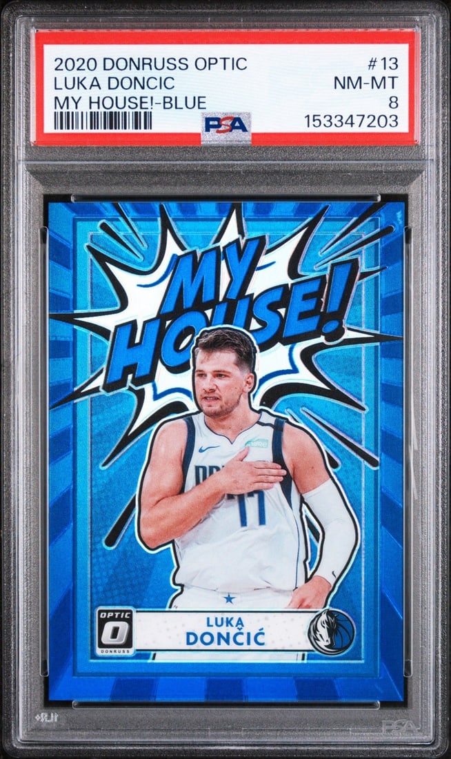 2020 DONRUSS OPTIC LUKA DONCIC #13 MY HOUSE BLUE/ 85 PSA 8: 2020 DONRUSS OPTIC LUKA DONCIC #13 MY HOUSE BLUE/ 85 PSA 8 The 2020 Donruss Optic Luka Doncic #13 Blue card is a highly graded PSA 8, making it a standout among collectors. With only 85 prints in exis