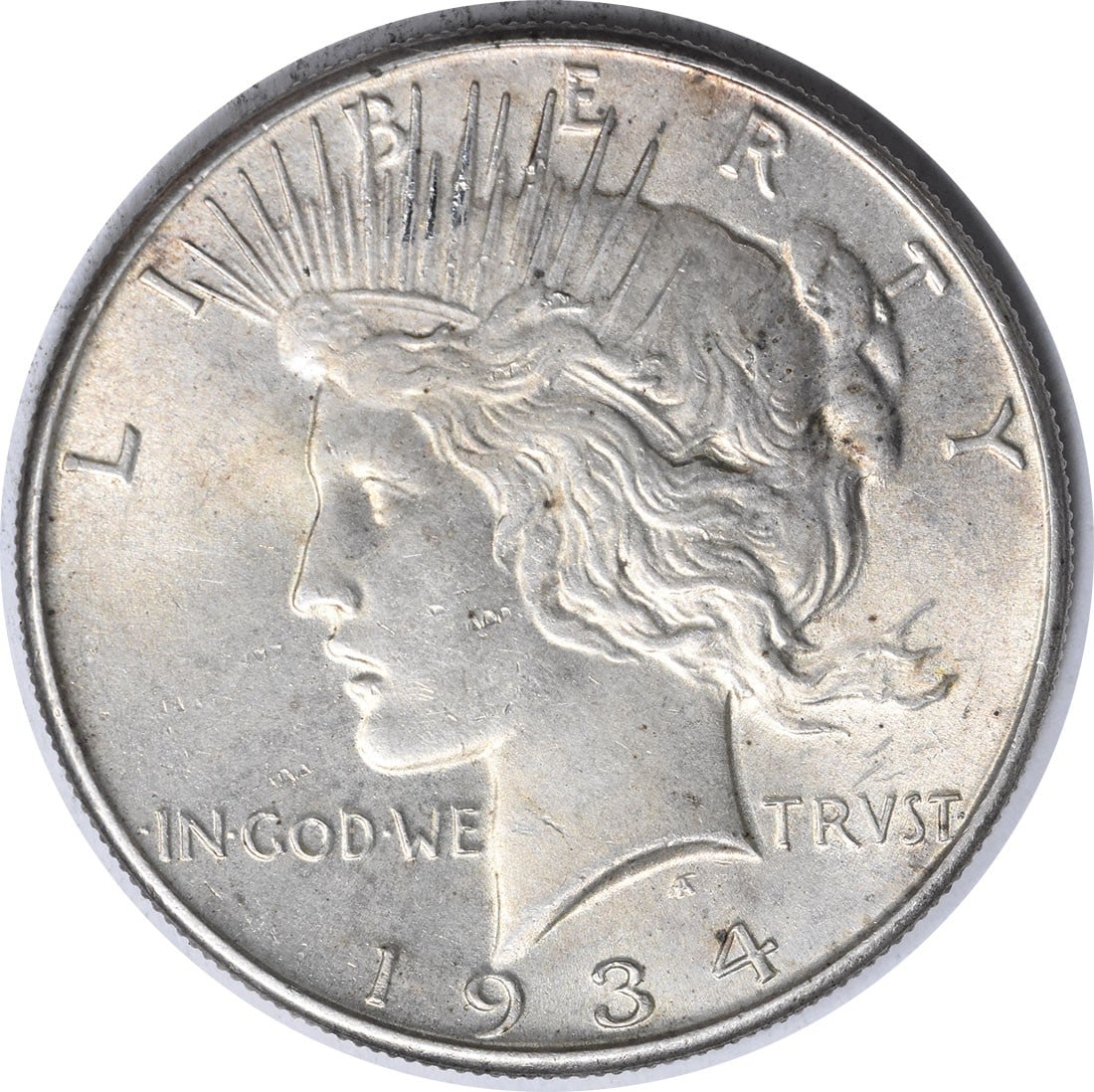 1934 Peace Silver Dollar Choice BU Uncertified: 1934 Peace Silver Dollar Choice BU Uncertified The 1934 Peace Silver Dollar is an Uncirculated coin with a high grade of MS63, boasting excellent condition and a rich silver composition. Certified as 