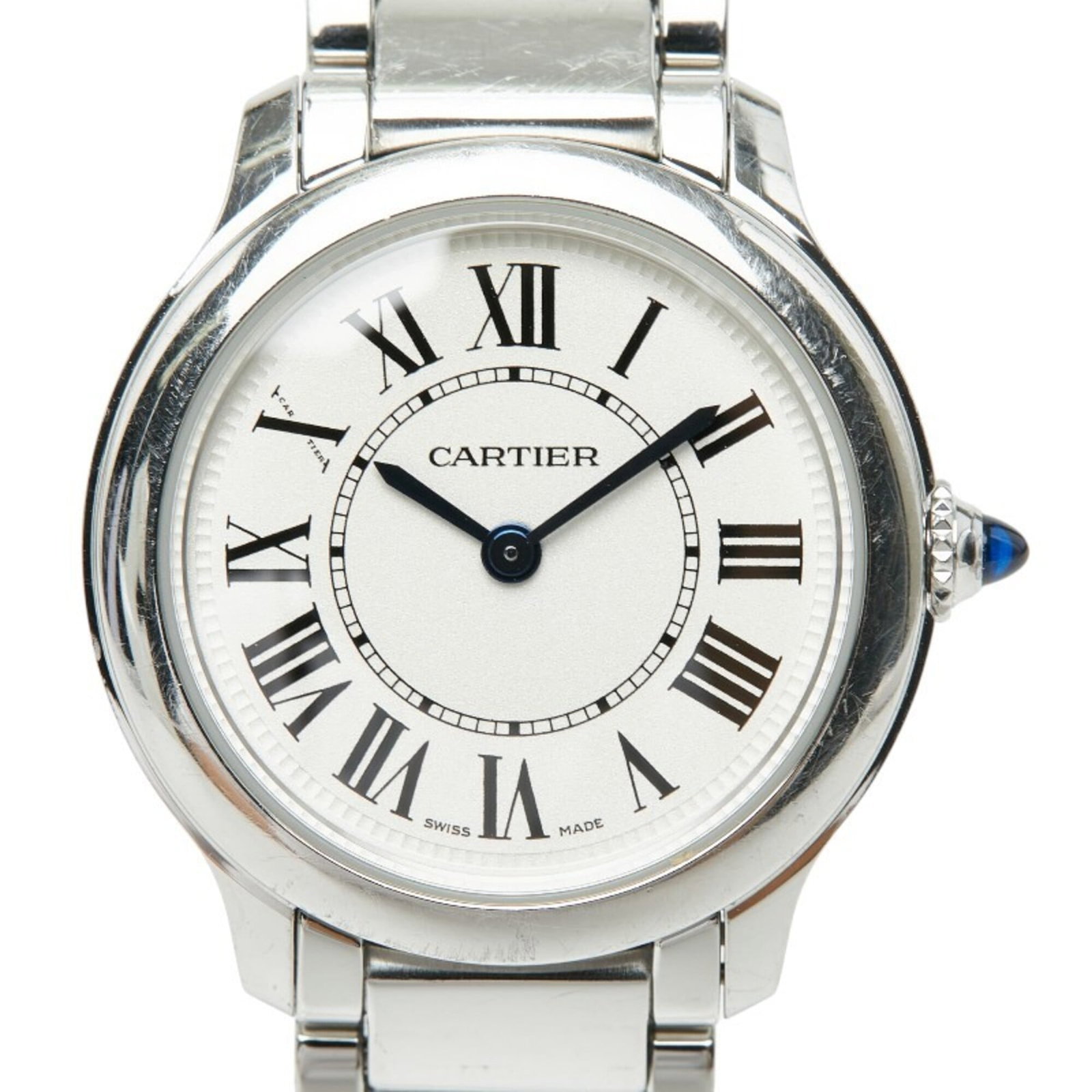 Cartier Wristwatch: Cartier Wristwatch Stainless steel case and band provide a sleek, modern look for the Cartier wristwatch. The white dial stands out against the watch's metallic base, while quartz movement keeps time 