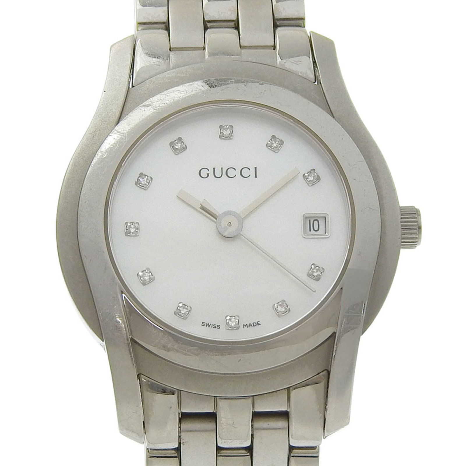 Wristwatch from Gucci: Wristwatch from Gucci Stainless steel case and band add a sleek touch to this quartz-powered Gucci wristwatch, featuring a white shell dial. The compact 27mm design makes it a stylish accessory for ev