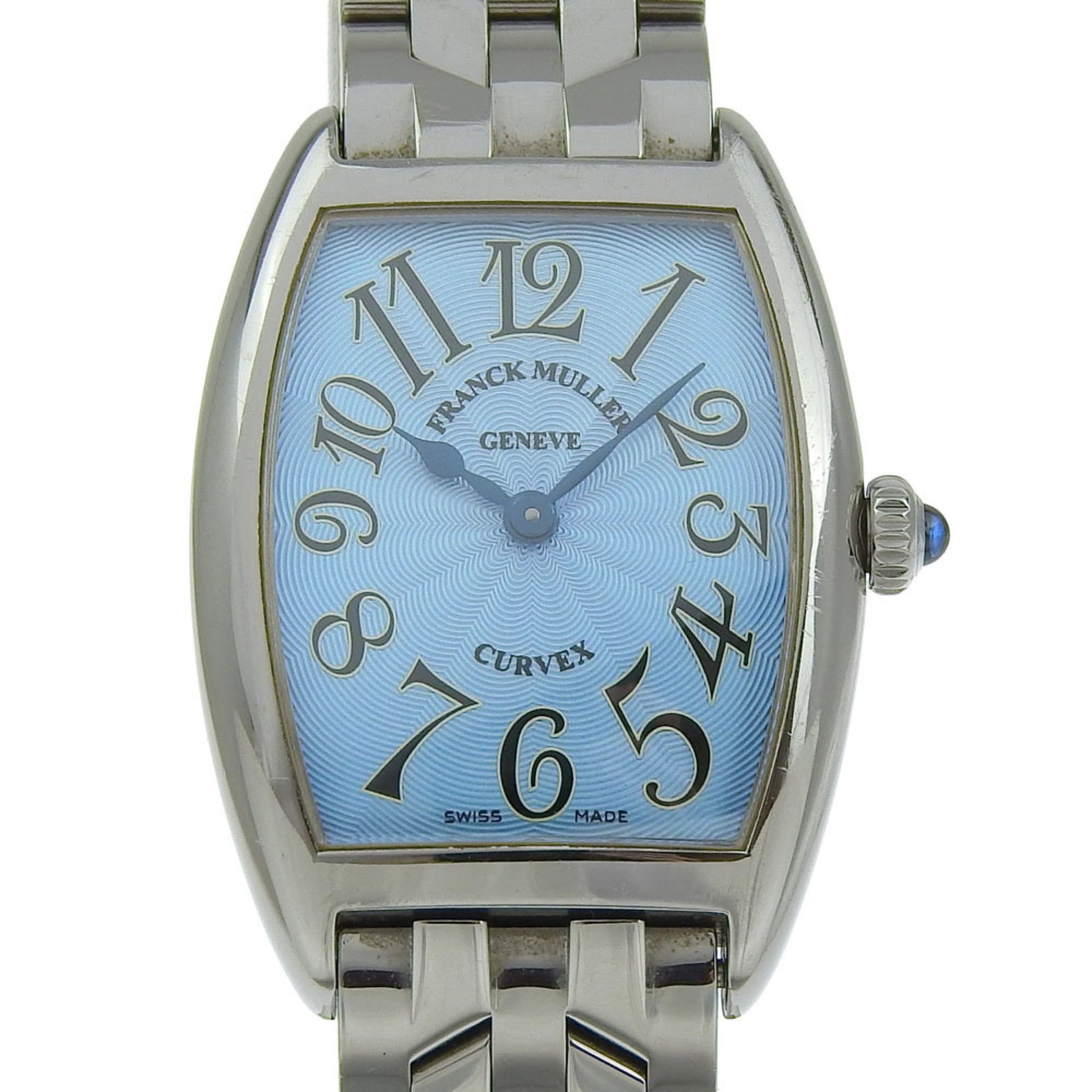 Franck Muller Wristwatch: Franck Muller Wristwatch Stainless steel case and band provide a sleek, modern look for this Franck Muller wristwatch. The blue dial stands out against the neutral background, adding a pop of color to