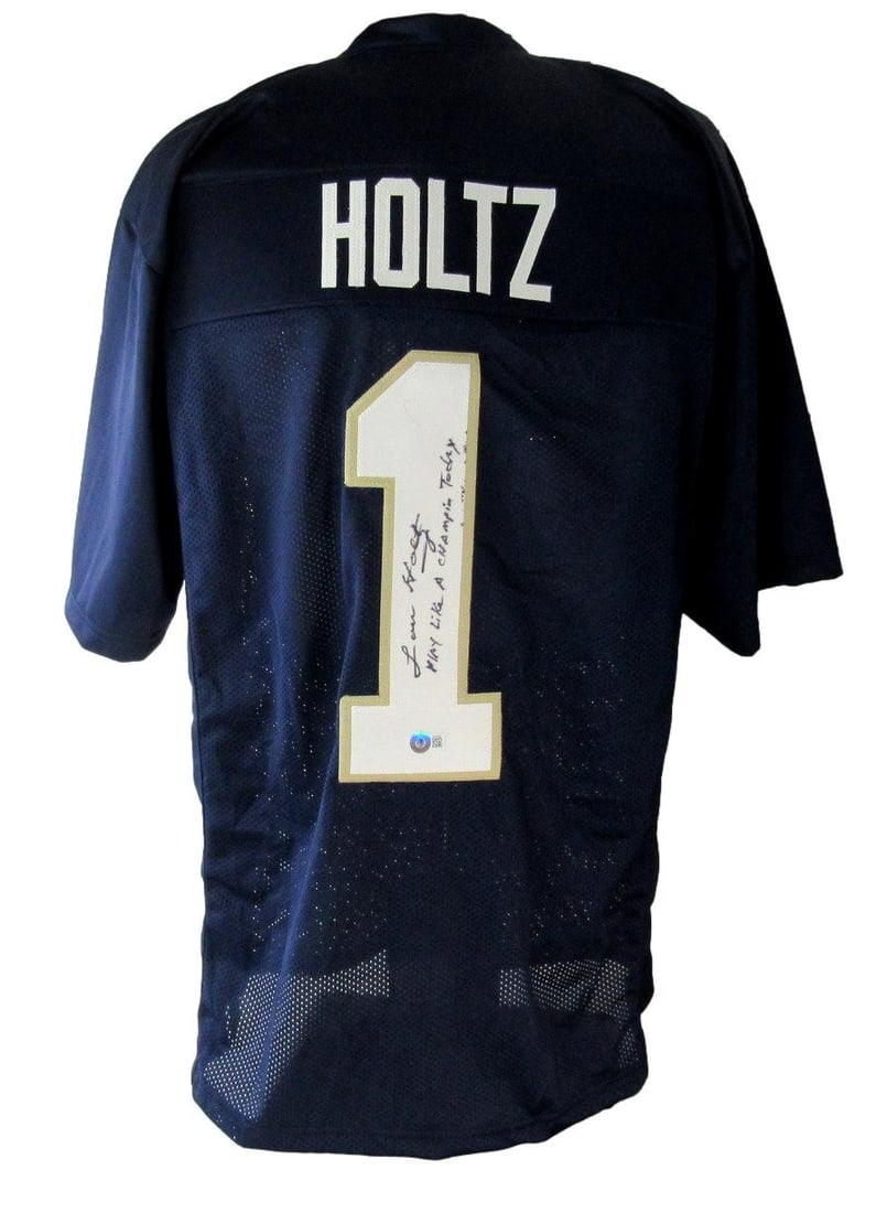 Lou Holtz Signed/ Inscr Navy Custom Football Jersey Notre Dame Beckett 211009: Lou Holtz Signed/ Inscr Navy Custom Football Jersey Notre Dame Beckett 211009 Lou Holtz signed Navy Custom Football Jersey, officially licensed by Notre Dame. This unique jersey features the signature