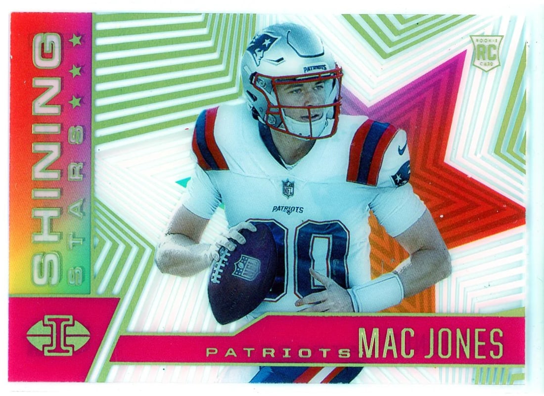 Mac Jones 2021 Panini Illusions Shining Stars Rookie Card #SS-16: Mac Jones 2021 Panini Illusions Shining Stars Rookie Card #SS-16 91/399. Mac Jones 2021 Panini Illusions Shining Stars Rookie Card #SS-16, numbered and signed by artist. A unique piece from the 2021 P