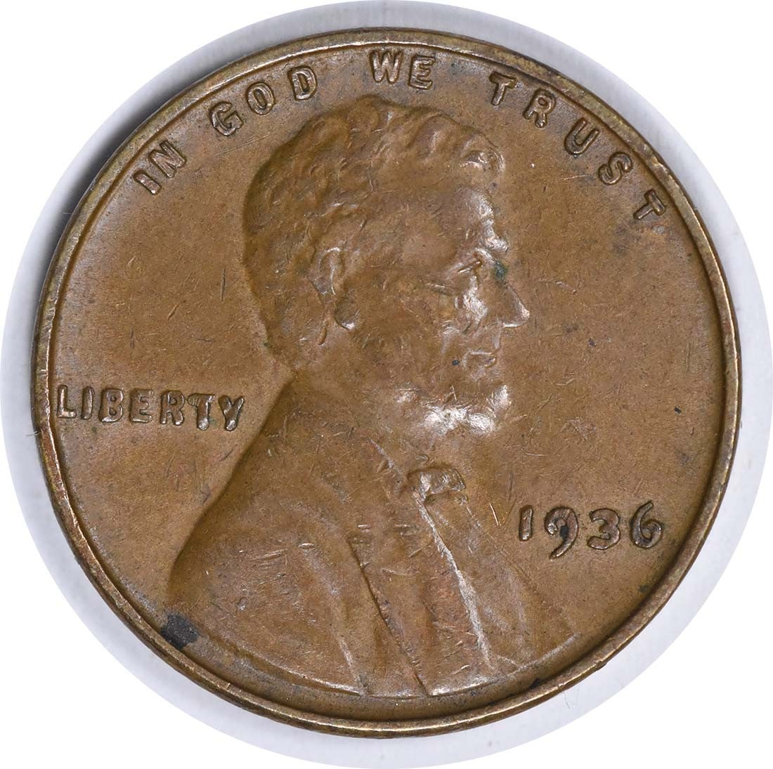 Uncertified Cent DDO AU 1936 Lincoln FS-101: Uncertified Cent DDO AU 1936 Lincoln FS-101 The 1936 Lincoln Wheat cent, KM 132, features a copper composition and bears the No Mint Mark. This circulated coin was minted in 1936 and showcases the ico