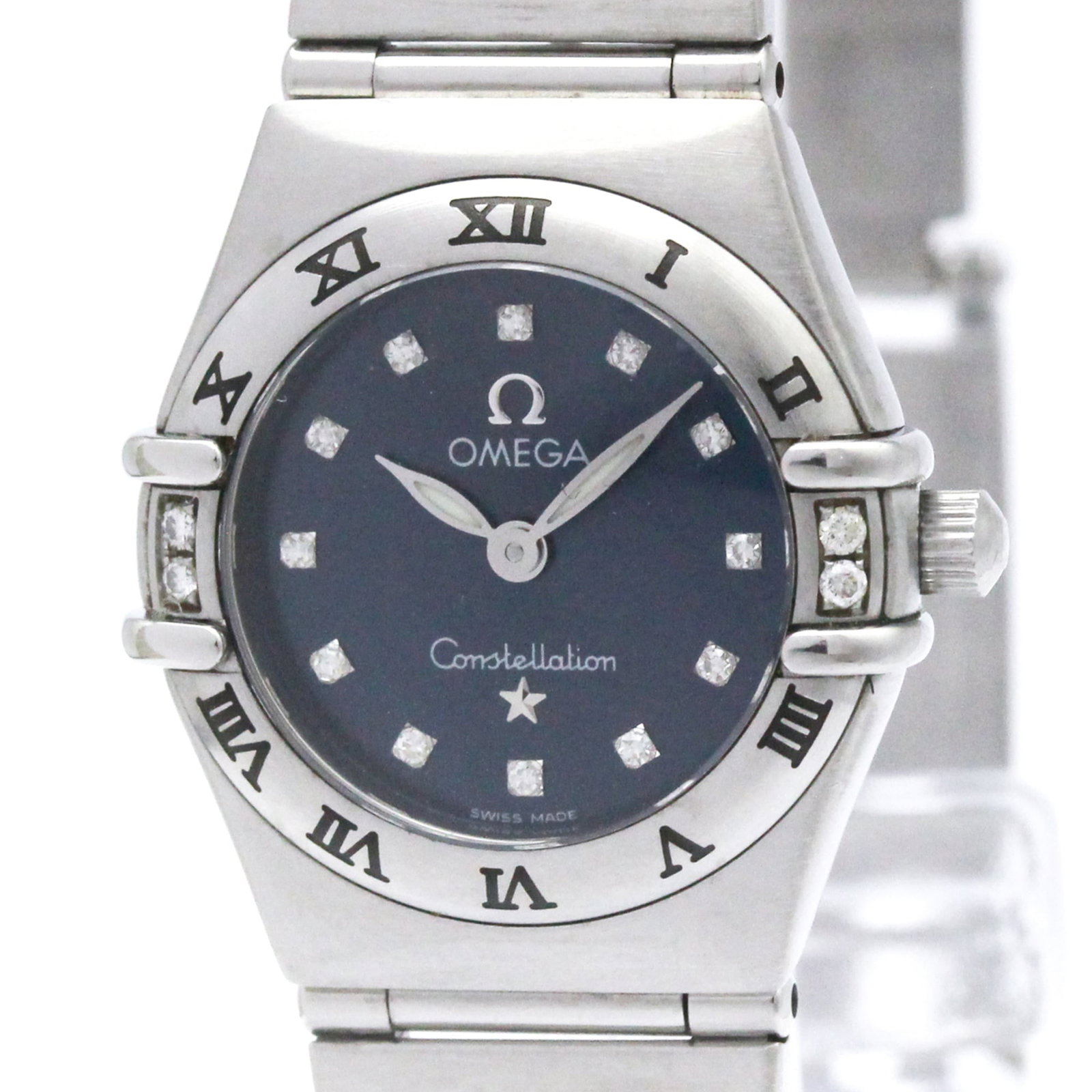 Omega Wristwatch: Omega Wristwatch Stainless steel case and band provide a sleek, modern look for the Omega Constellation watch. The blue dial stands out against its durable background, while quartz movement keeps time