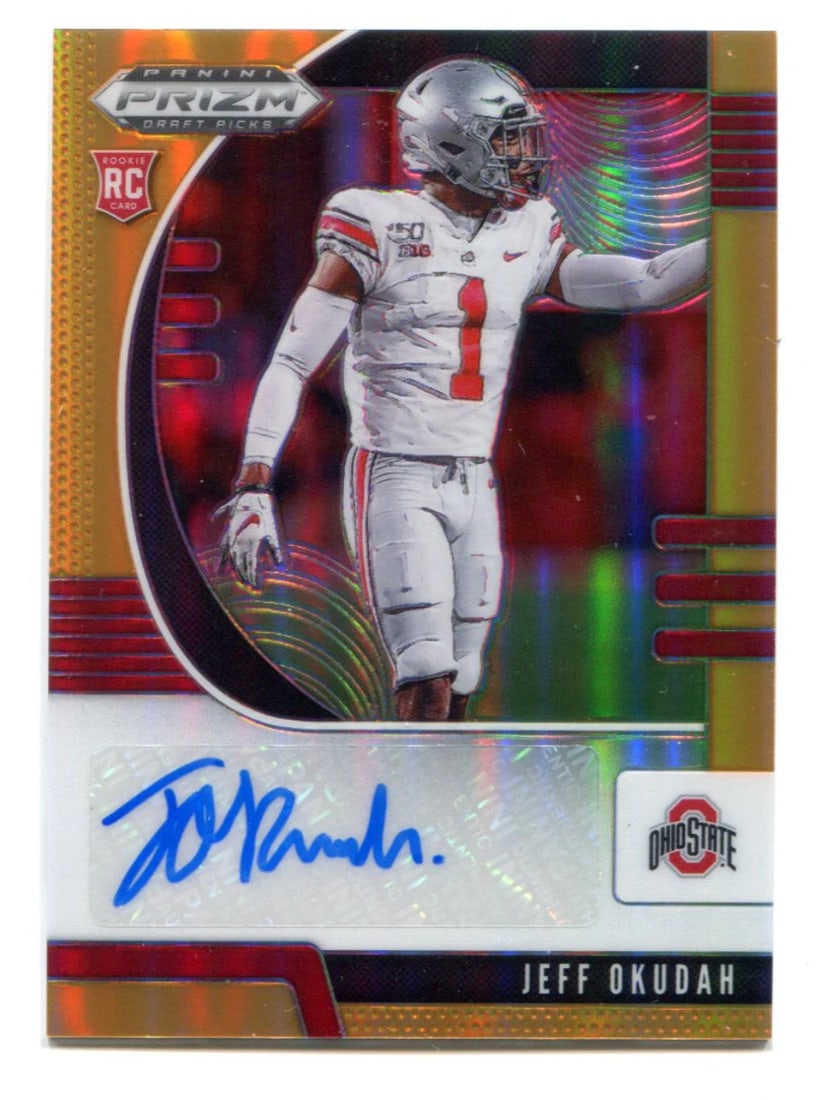 Jeff Okudah Autographed 2020 Panini Prizm Neon Orange Prizm Rookie Card: Jeff Okudah Autographed 2020 Panini Prizm Neon Orange Prizm Rookie Card Signed in blue sharpie across the front, Jeff Okudah's rookie card boasts a vibrant Neon Orange Prizm design. Numbered 39 out of