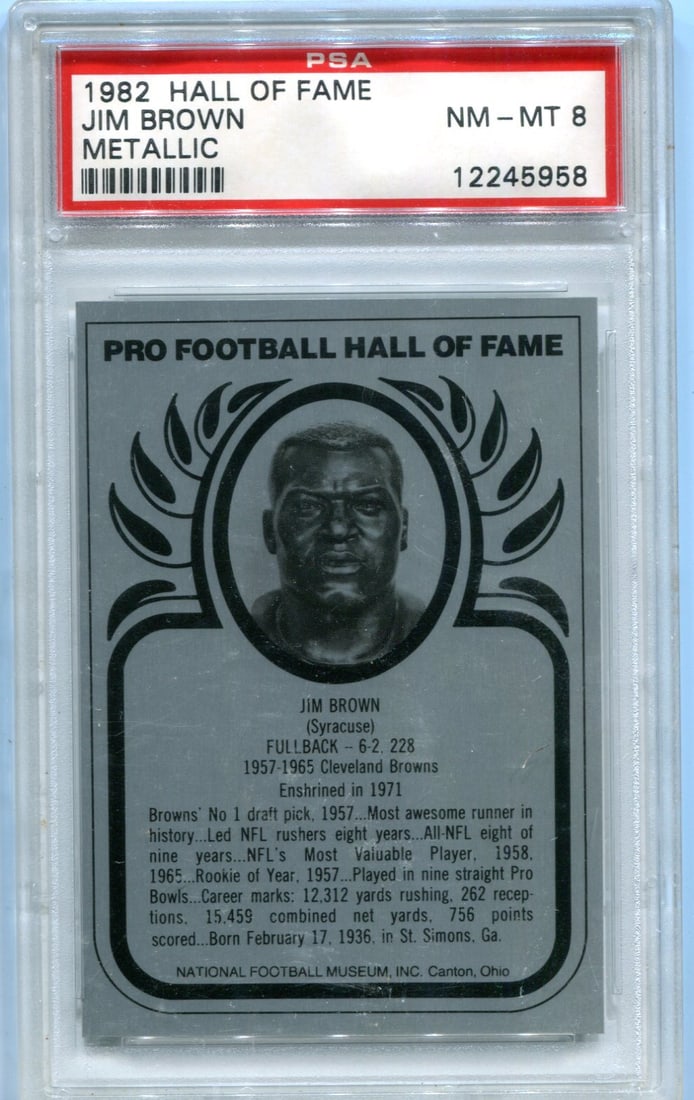 Jim Brown 1982 PSA 8 Hall of Fame Card: Jim Brown 1982 PSA 8 Hall of Fame Card Jim Brown's 1982 Hall of Fame Metallic Card boasts a PSA 8 grade, showcasing excellent condition and preservation. This iconic card features the legendary runnin