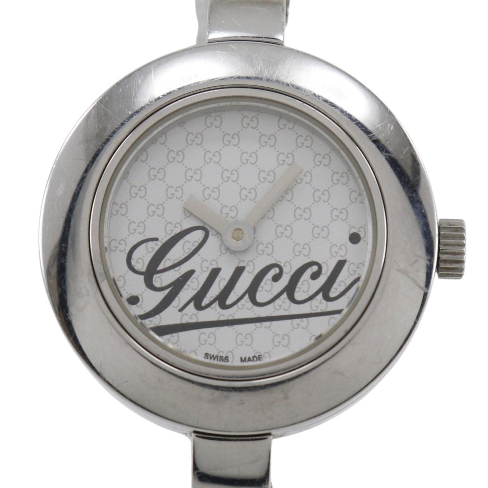 Wristwatch from Gucci: Wristwatch from Gucci Stainless steel case and band provide a sleek, modern look for this Gucci G-Circle wristwatch. The white analog dial stands out against the neutral background, adding a touch of 