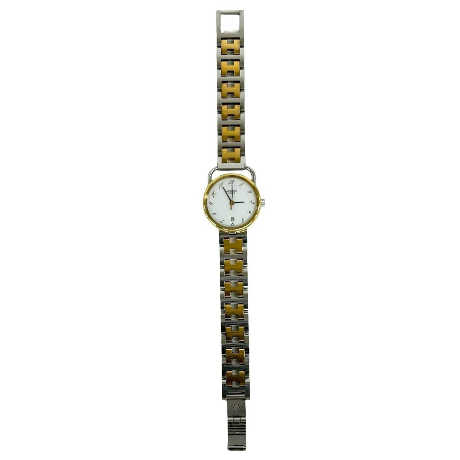 Hermes Wristwatch: Hermes Wristwatch Gold plated and stainless steel, this Hermes wristwatch boasts a sleek design with a 23mm case diameter. The quartz movement ensures accurate timekeeping, while the gold plated band 